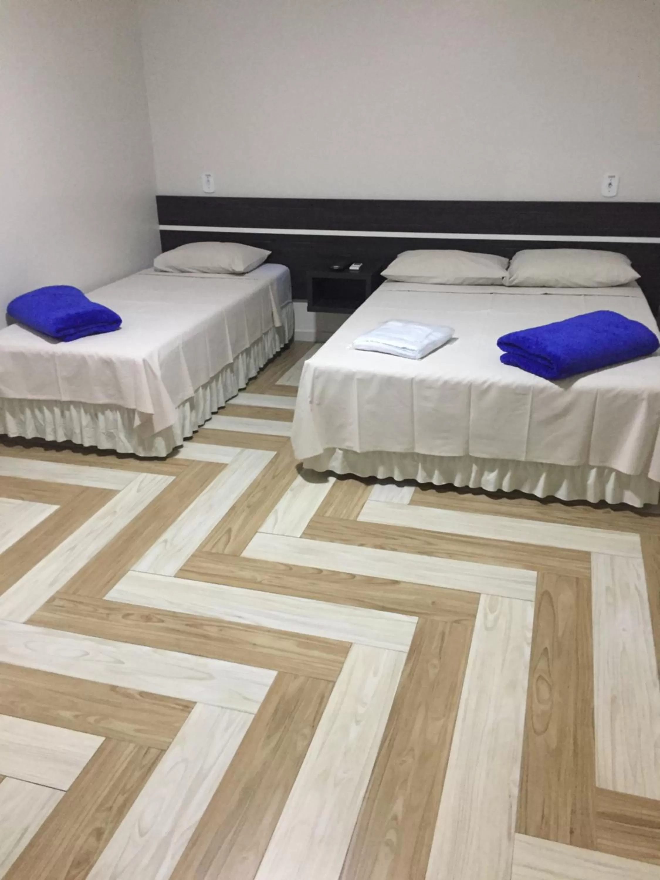 Bed in Hotel Paradizzo