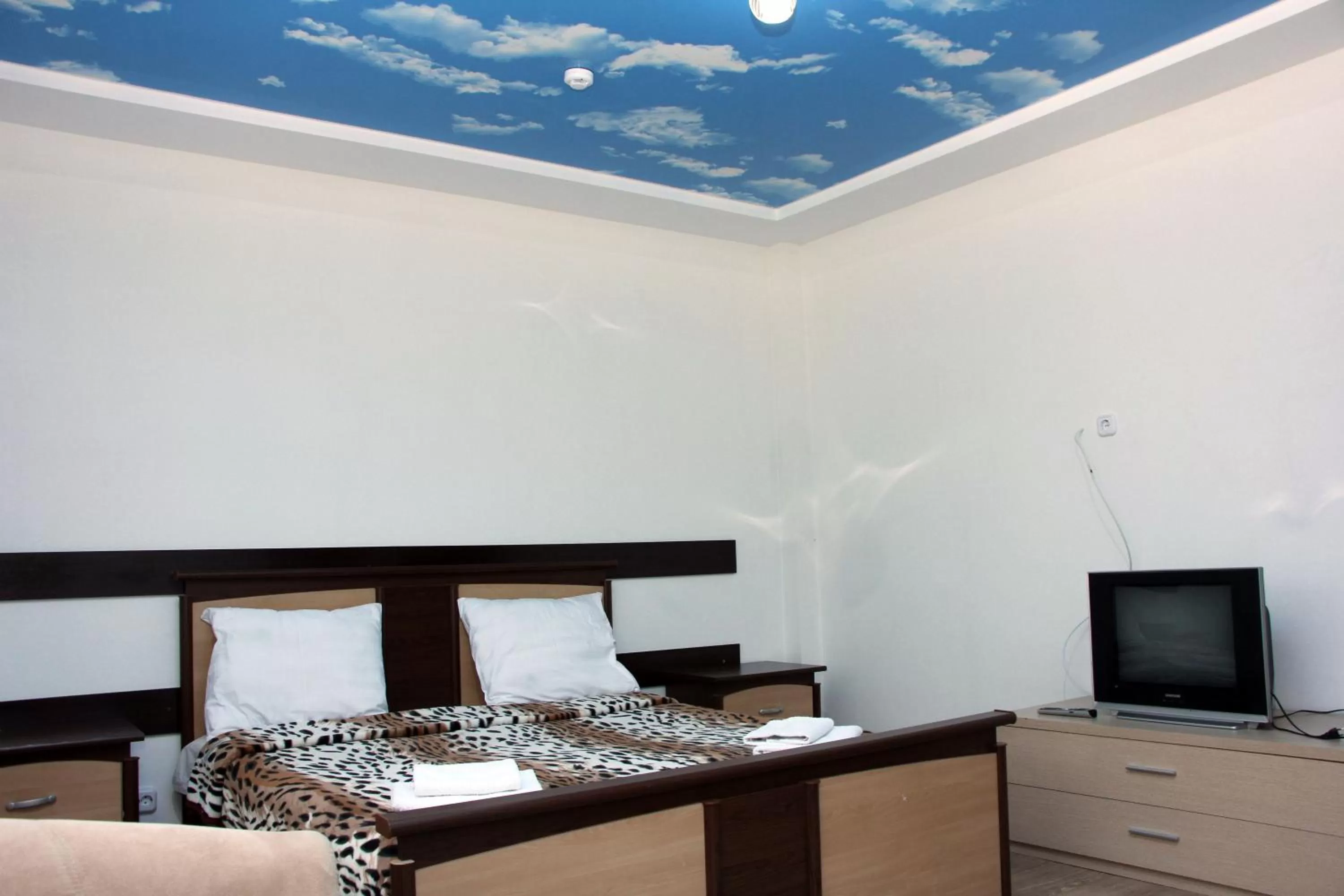 Bed in Zhaylau Hotel