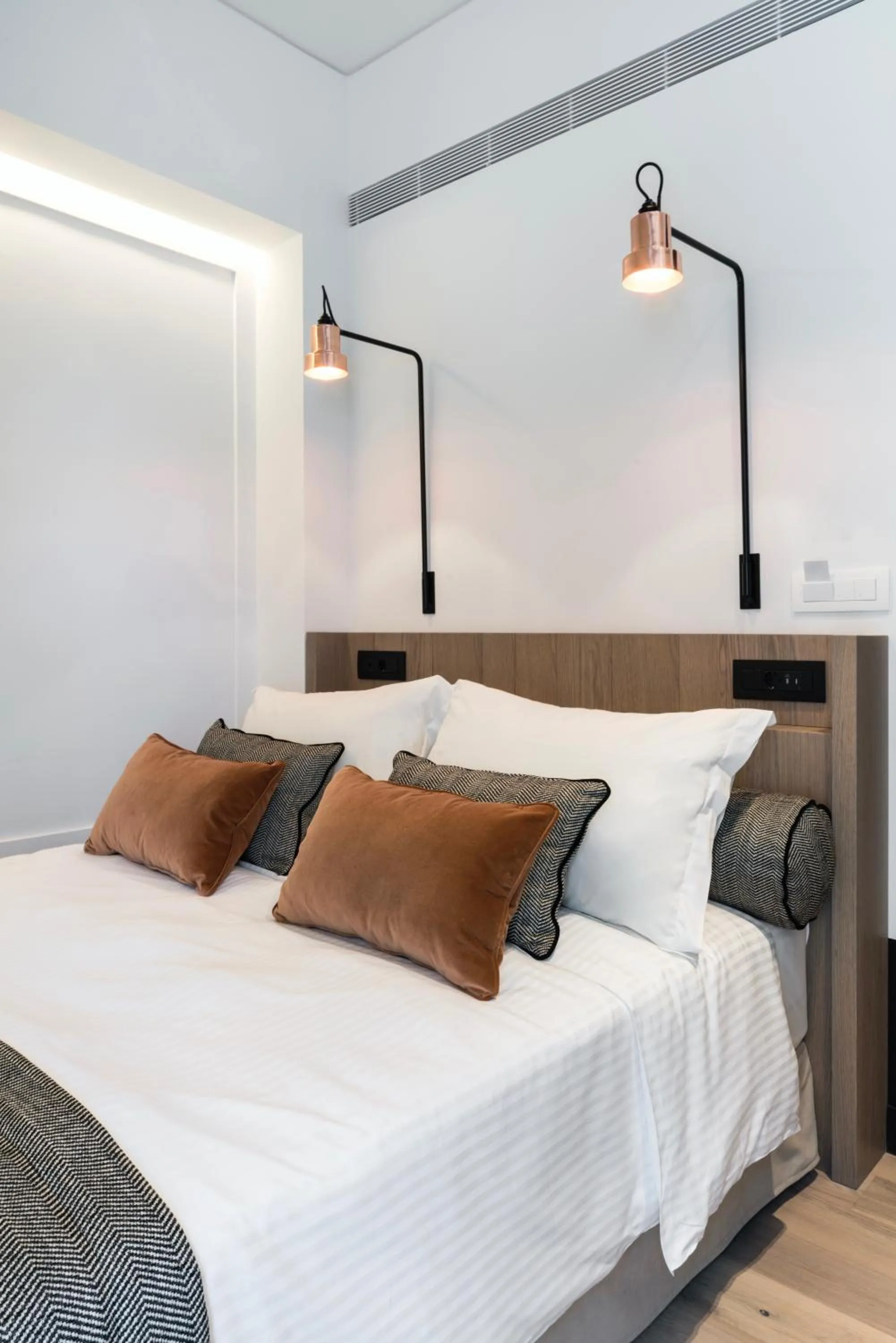 Bed in Niki Athens Hotel