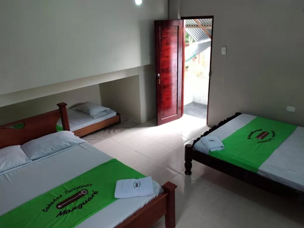 Photo of the whole room, Bed in Ecocabañas Manguare