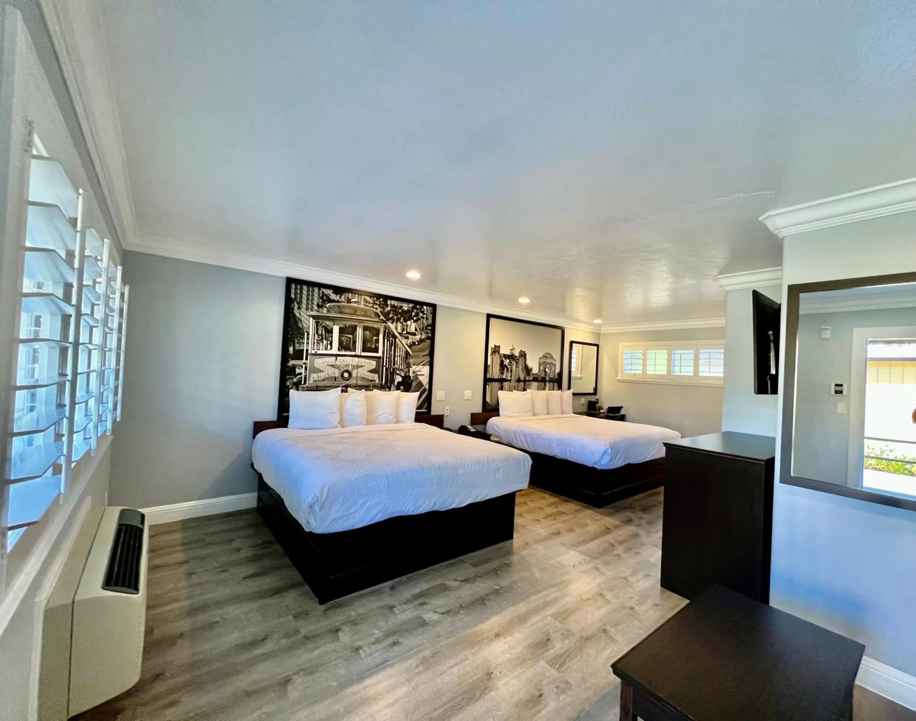 Bed in Aura Inn Monterey