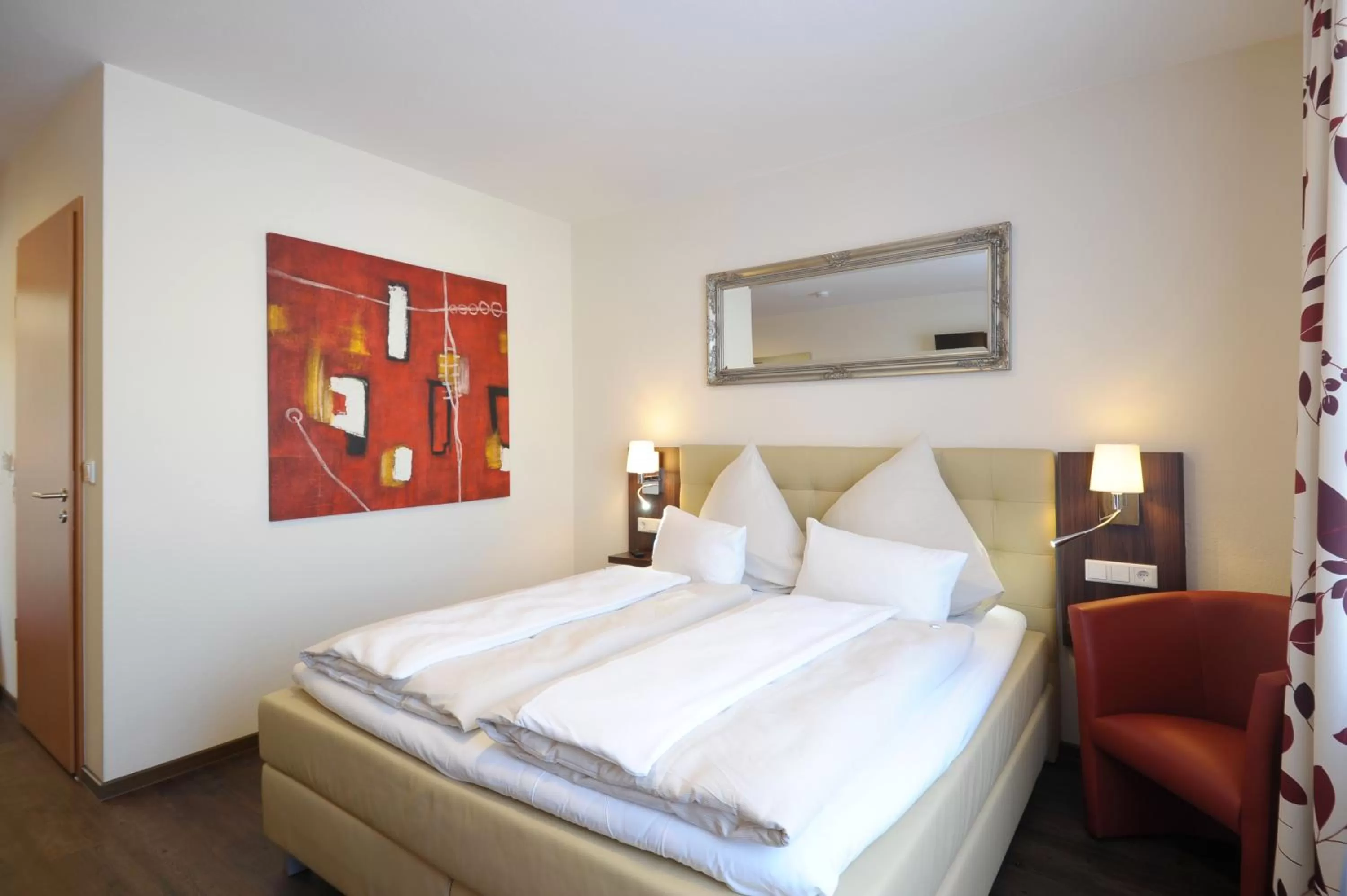 Photo of the whole room, Bed in Burgdorfs Hotel & Restaurant