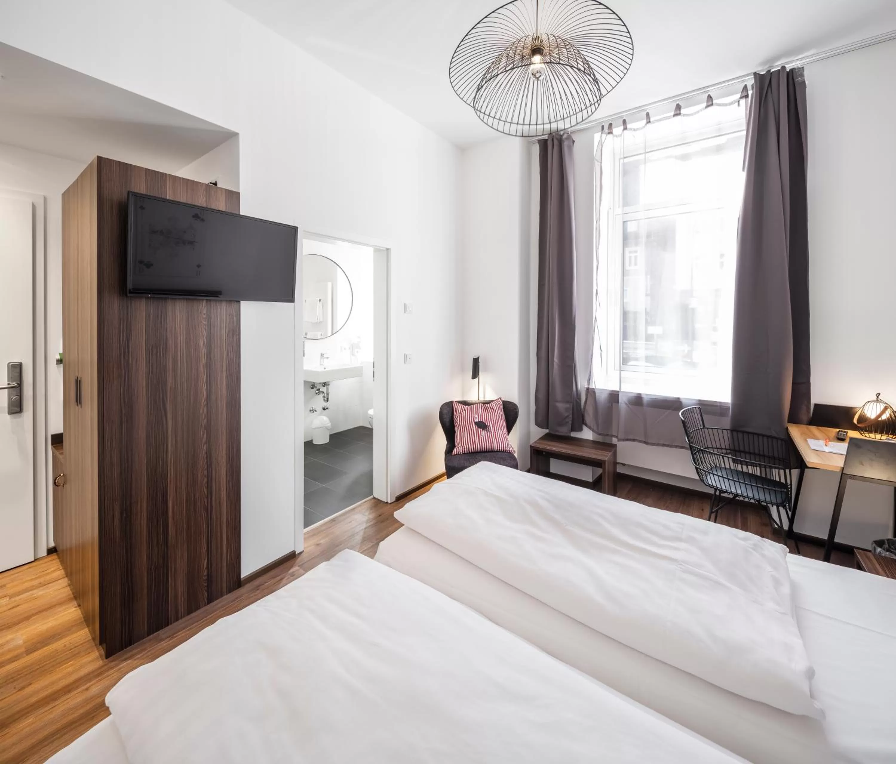 Communal lounge/ TV room, Bed in acor Boutique Hotel