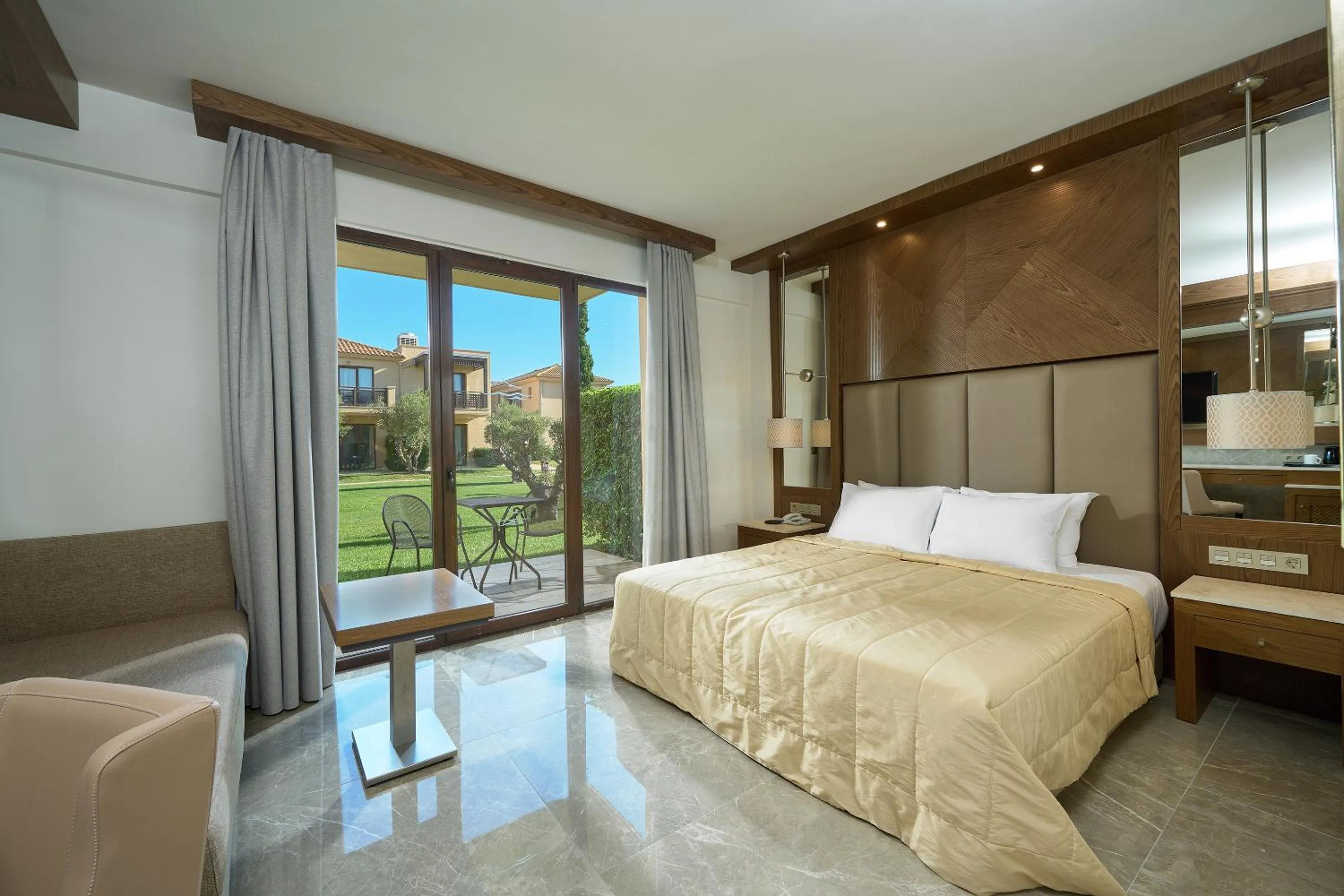 Bed in Mediterranean Village Hotel & Spa