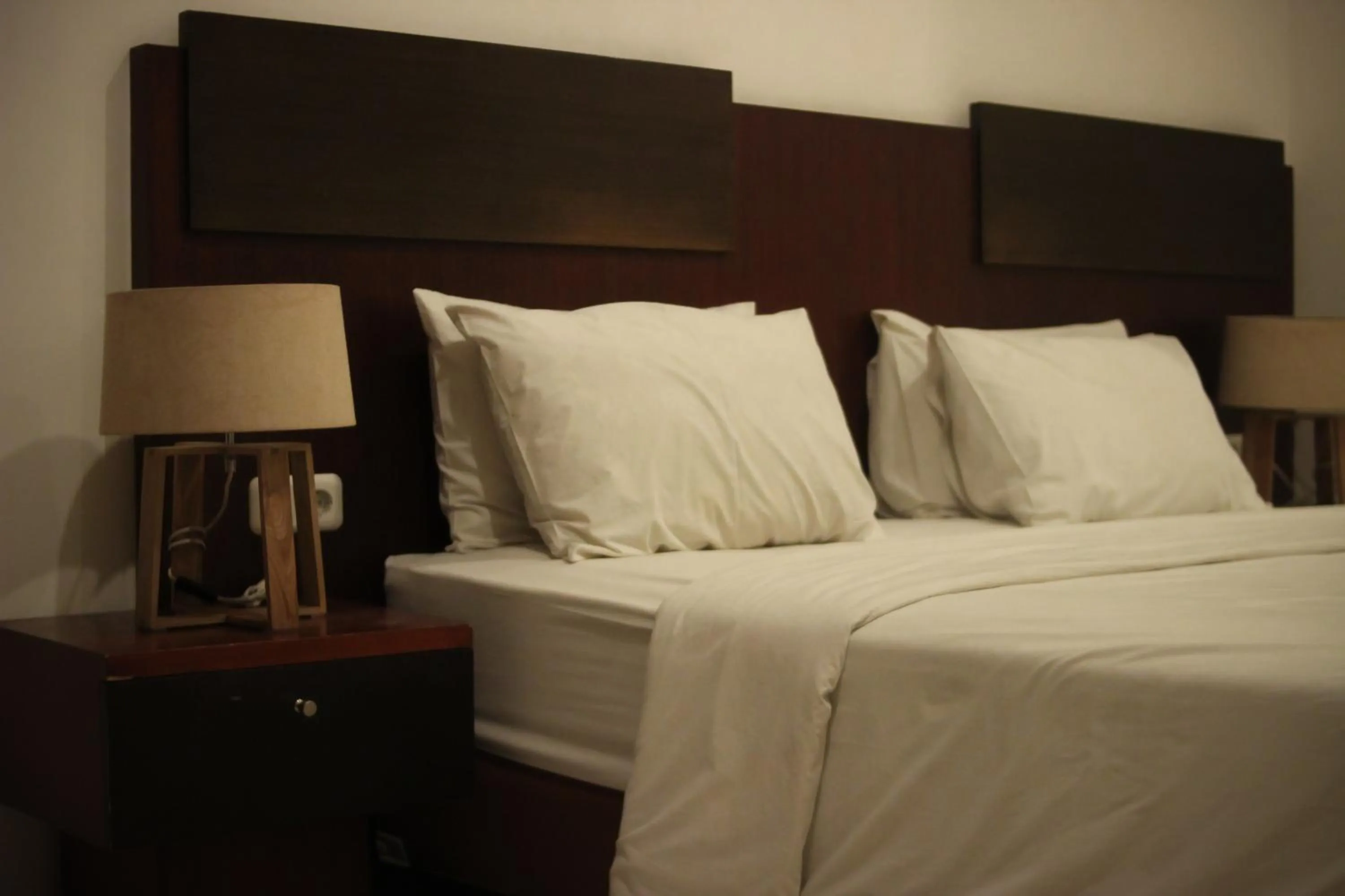 Bed in Hotel Graha Kinasih Kotabaru