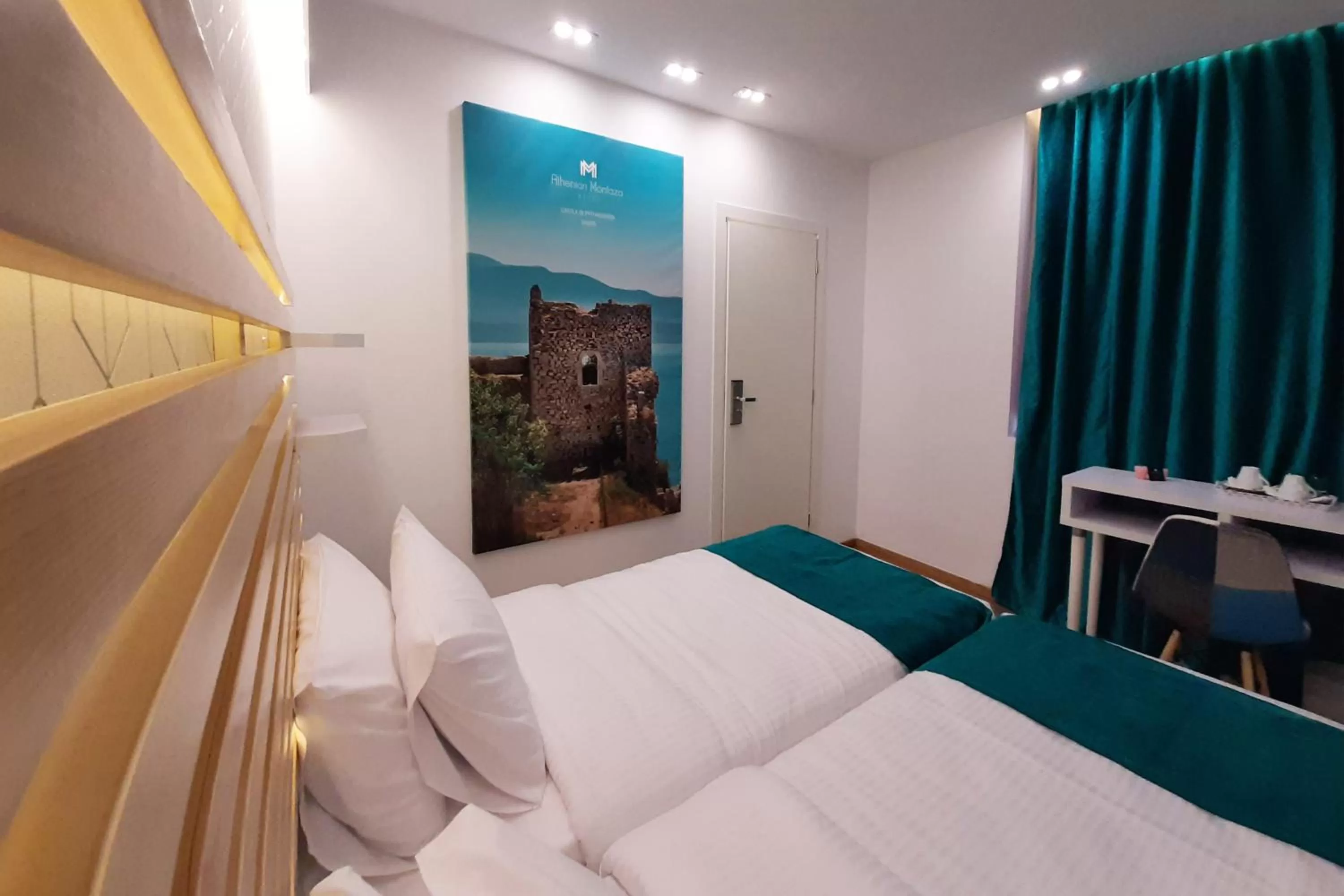 Bed in Athenian Montaza Hotel