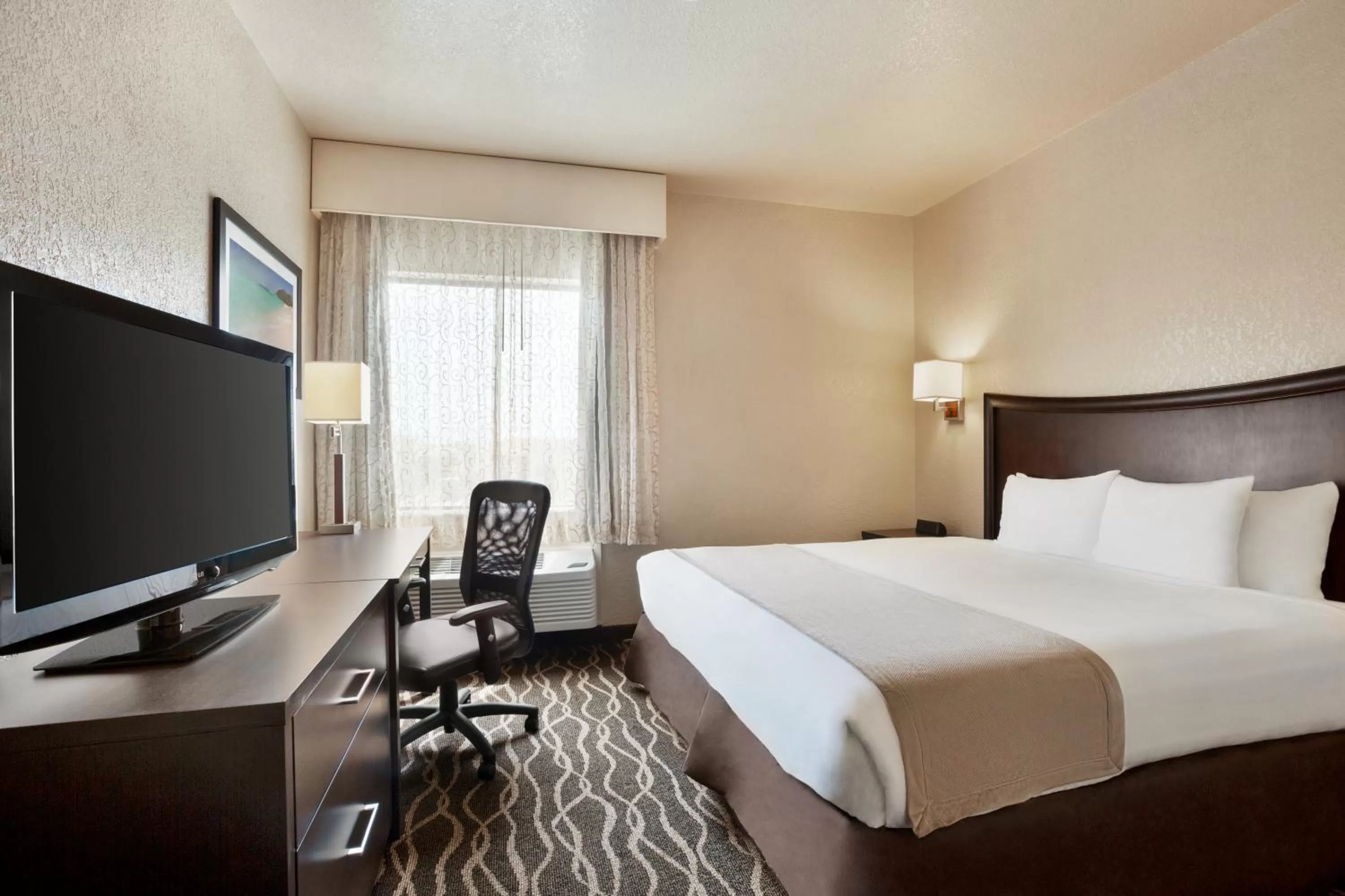 Bedroom, Bed in Baymont by Wyndham Clute Lake Jackson