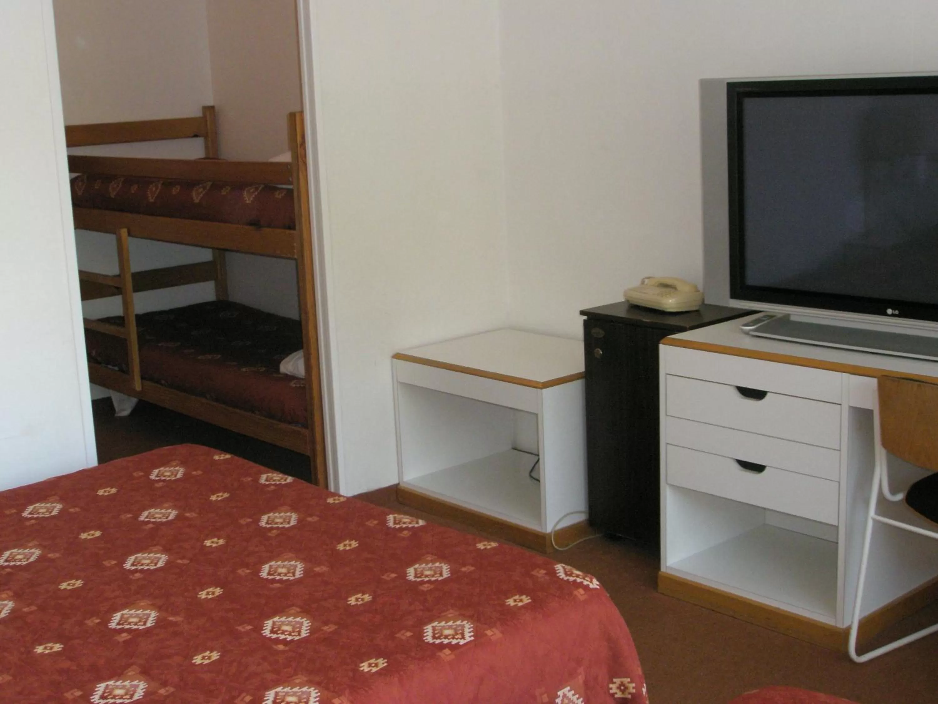 Photo of the whole room, Bed in Hôtel Restaurant Pavillon Carina