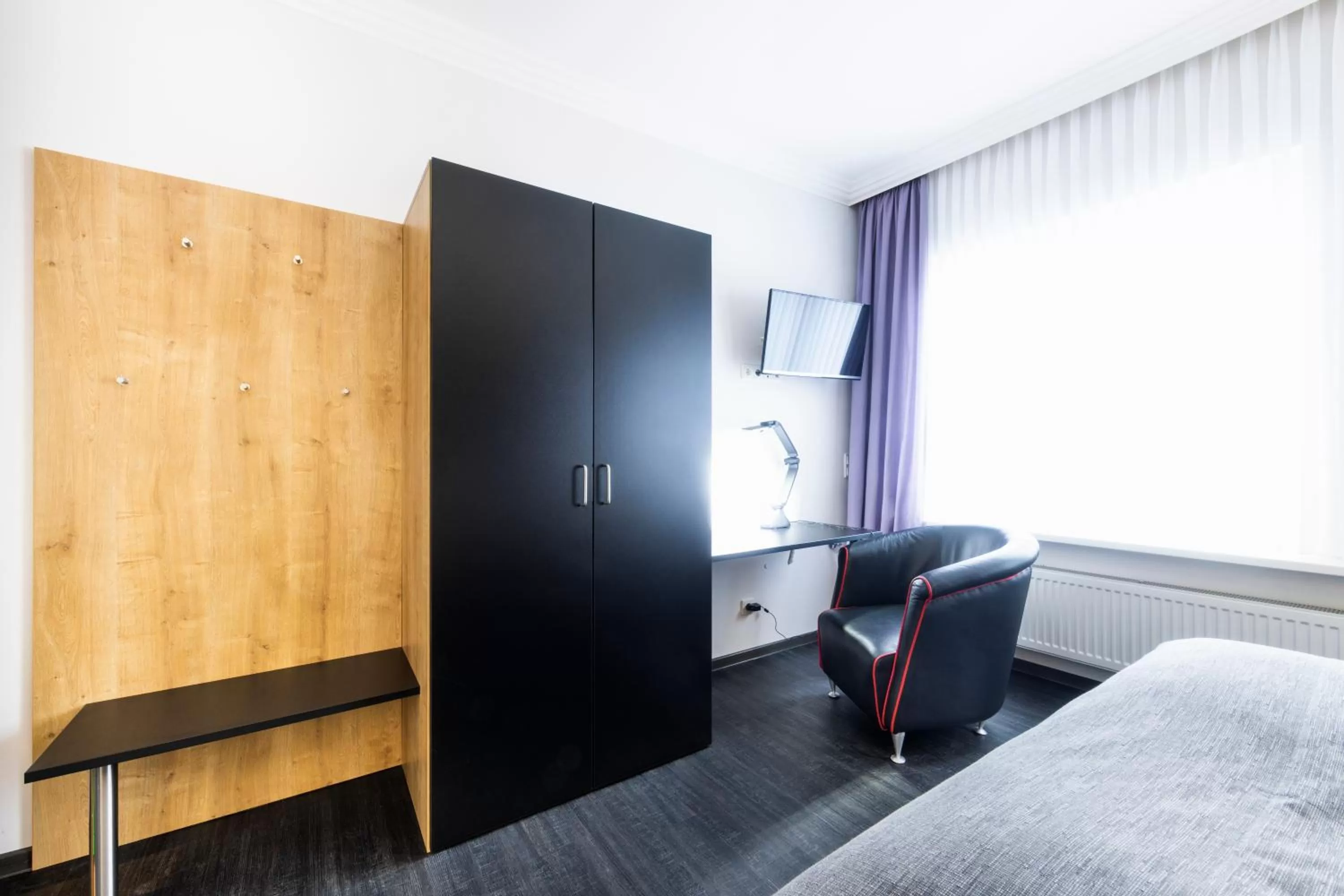 Seating area, Bed in Hochwald Lodge