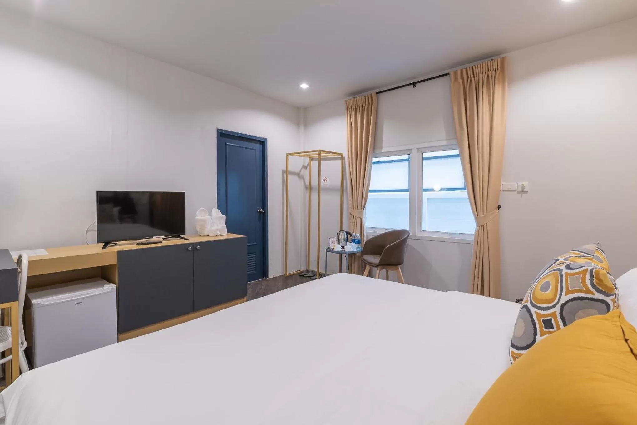 Photo of the whole room, Bed in The Mellow Pillow Hotel @ Chiang Mai Gate