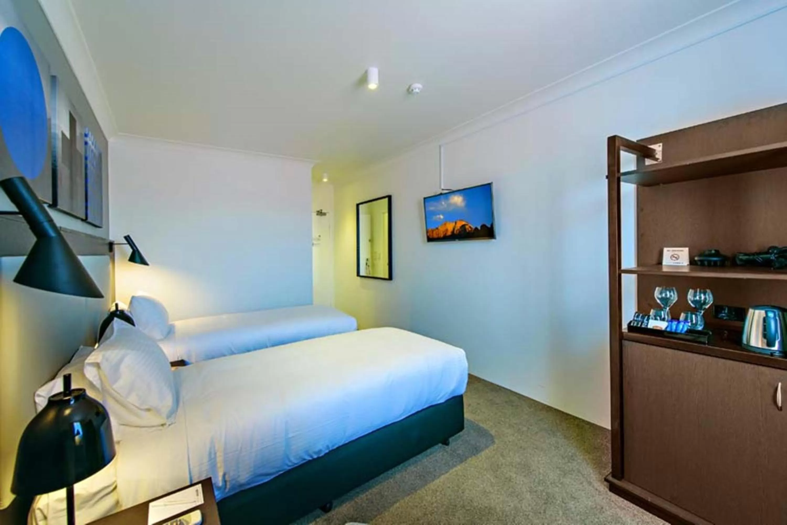 Bed in Silkari Urban CKS Sydney Airport Hotel