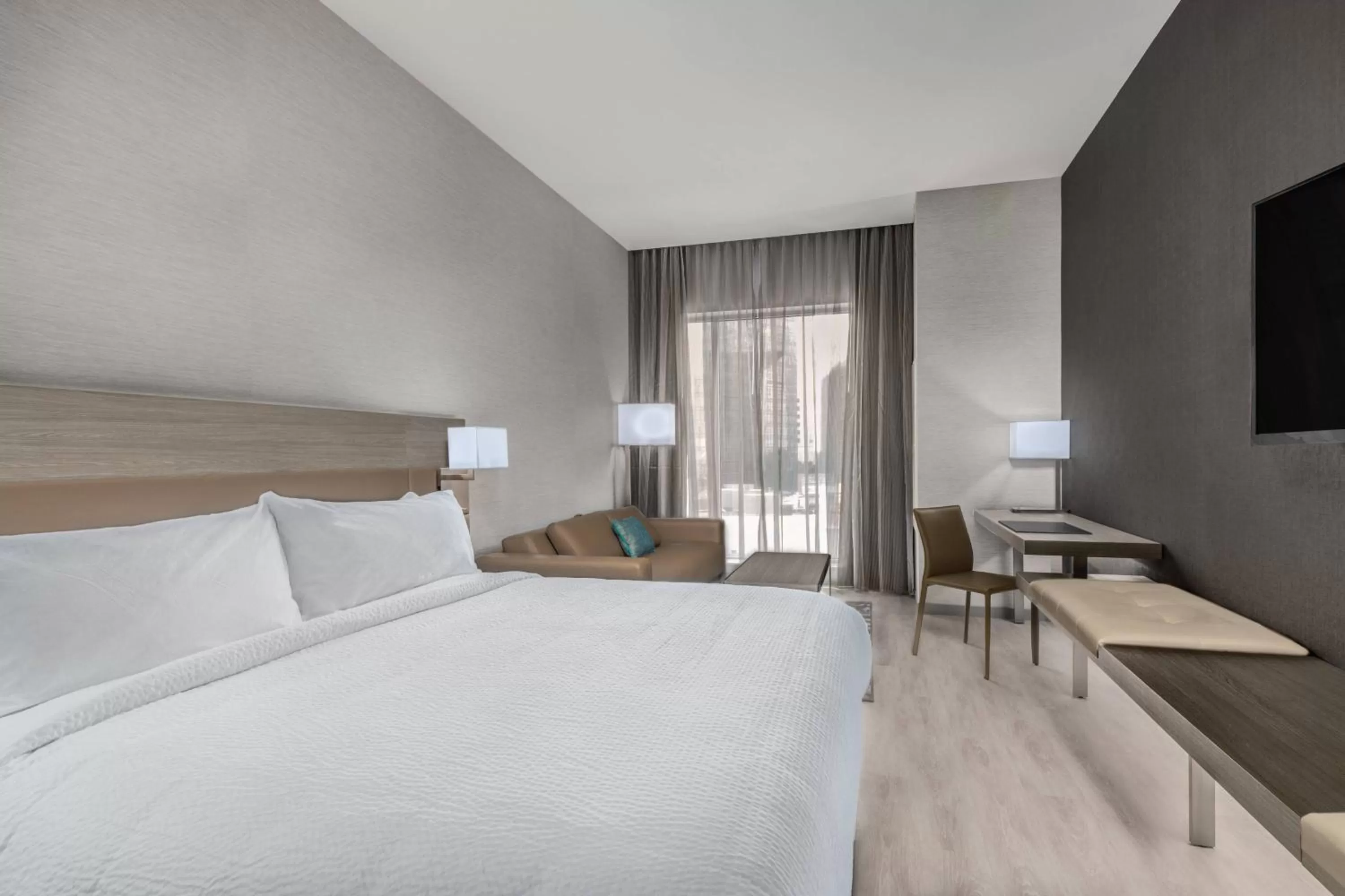 King Room with Sofa Bed - Hearing Accessible in AC Hotel by Marriott Charlotte City Center