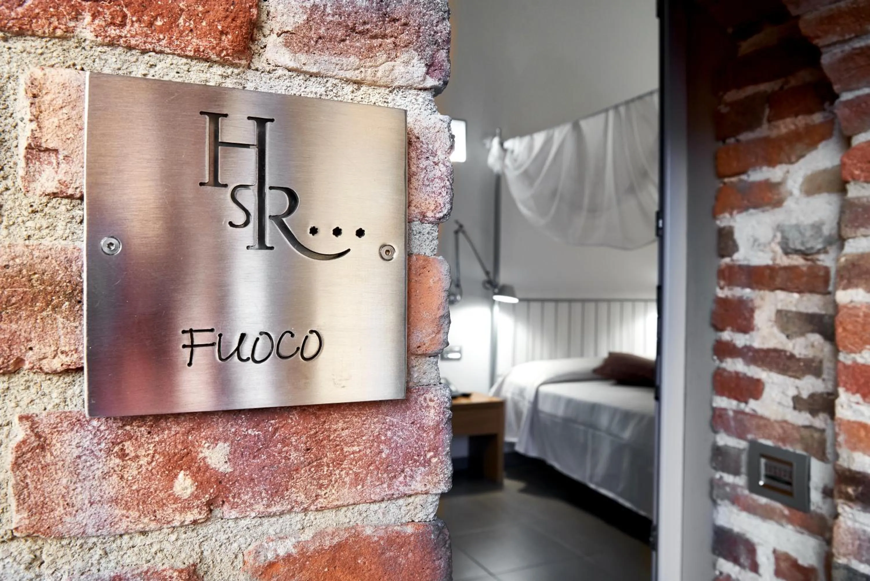 Property logo or sign, Bed in San Rocco Hotel