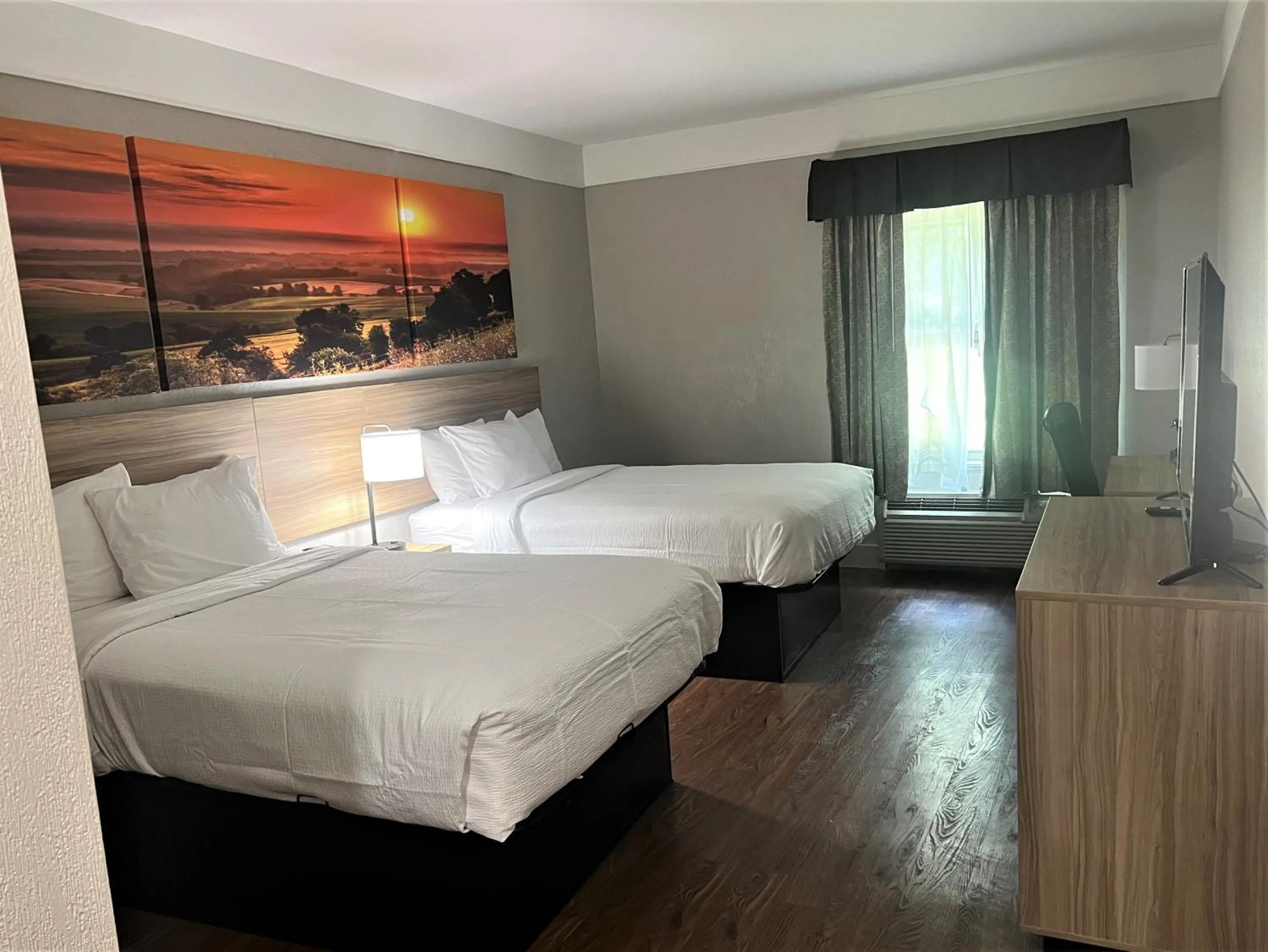 Bedroom, Bed in Days Inn by Wyndham Denham Springs-Baton Rouge East