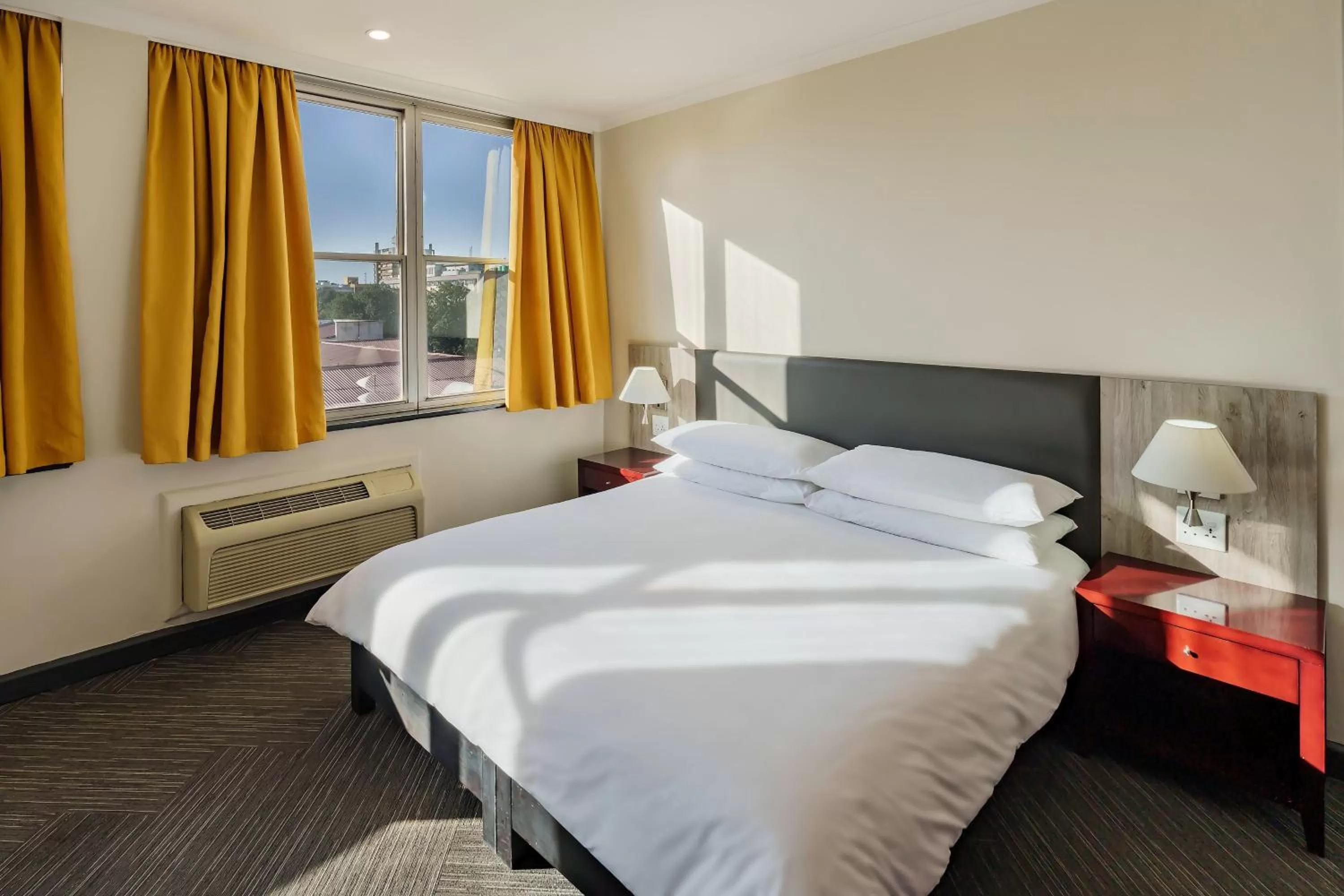 Photo of the whole room, Bed in Protea Hotel by Marriott Lusaka Cairo Road