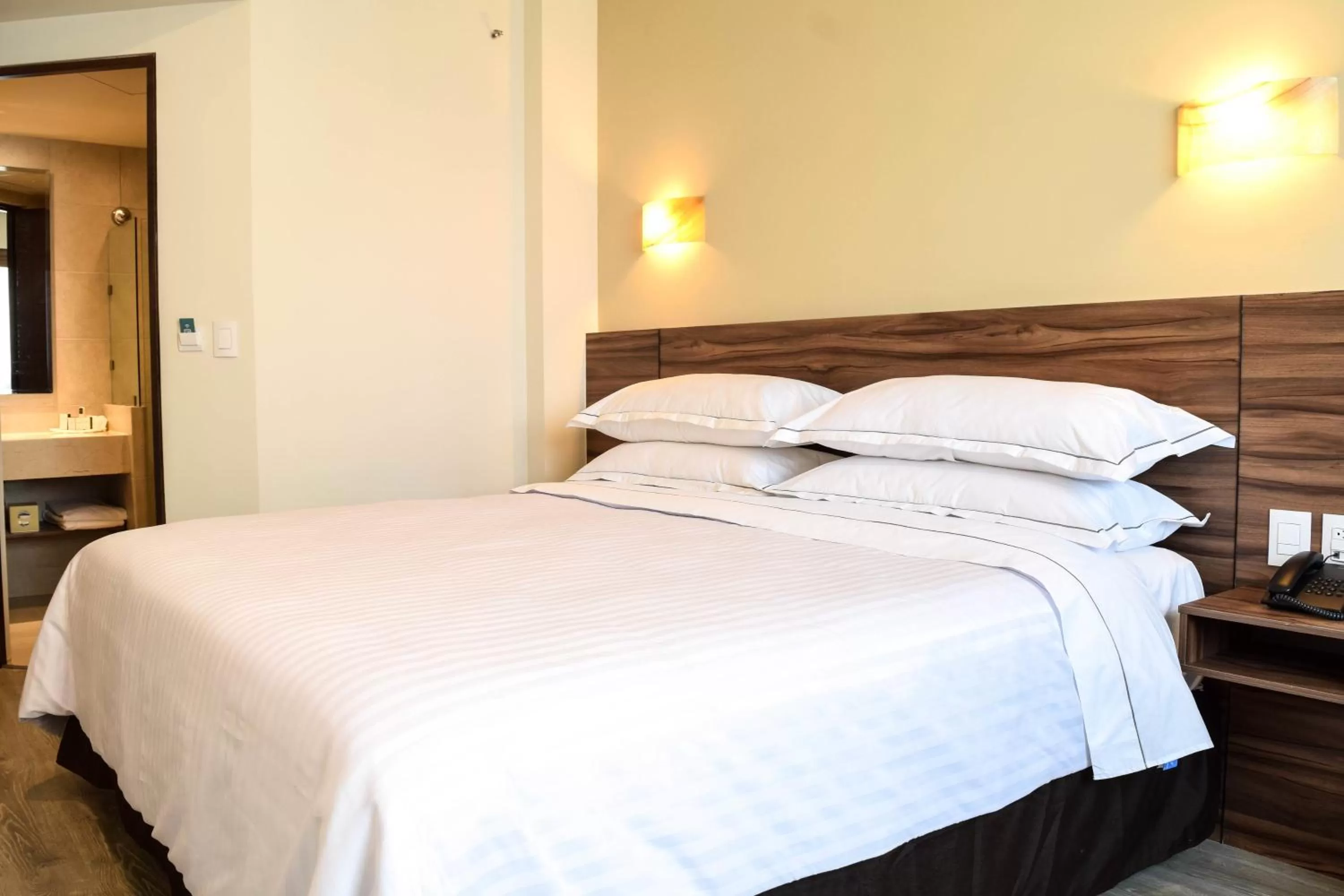 Decorative detail, Bed in Crown Victoria Hotel