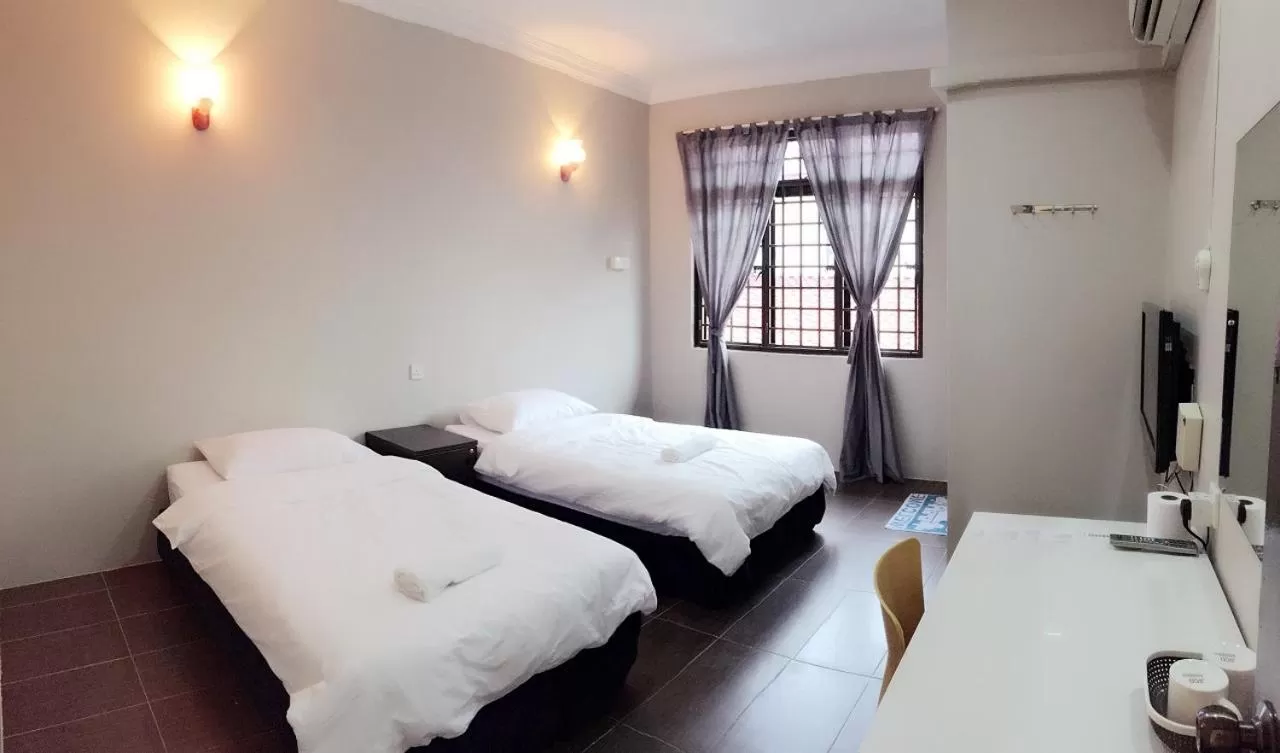 Photo of the whole room, Bed in Homestay Muar