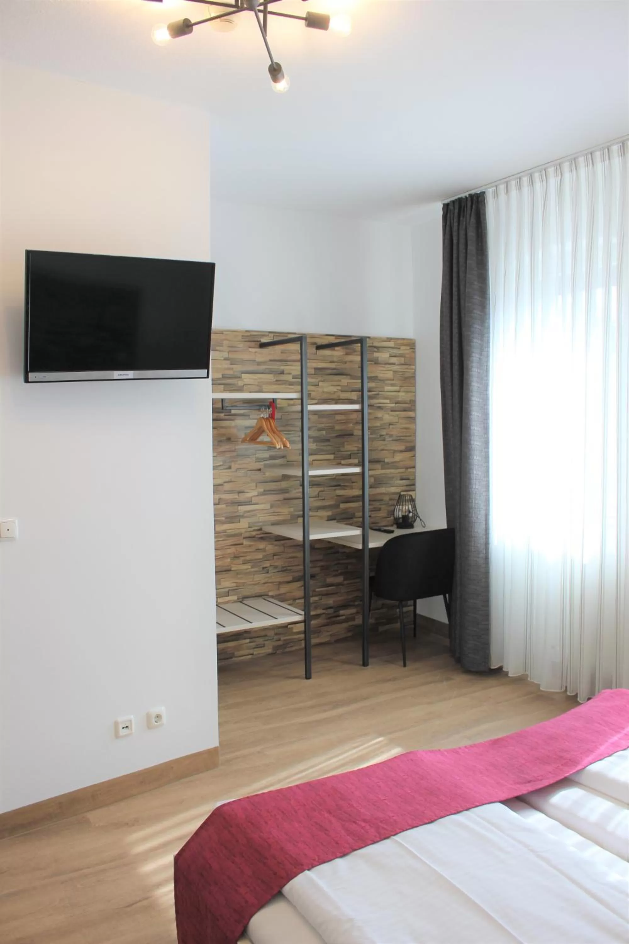 Photo of the whole room, Bed in Am Blumenhaus