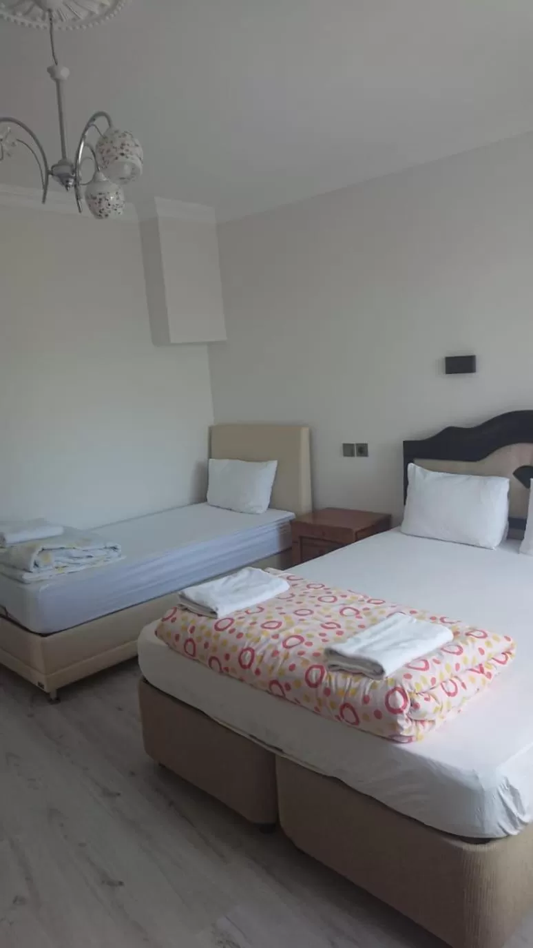 Bed in Ali's Pension