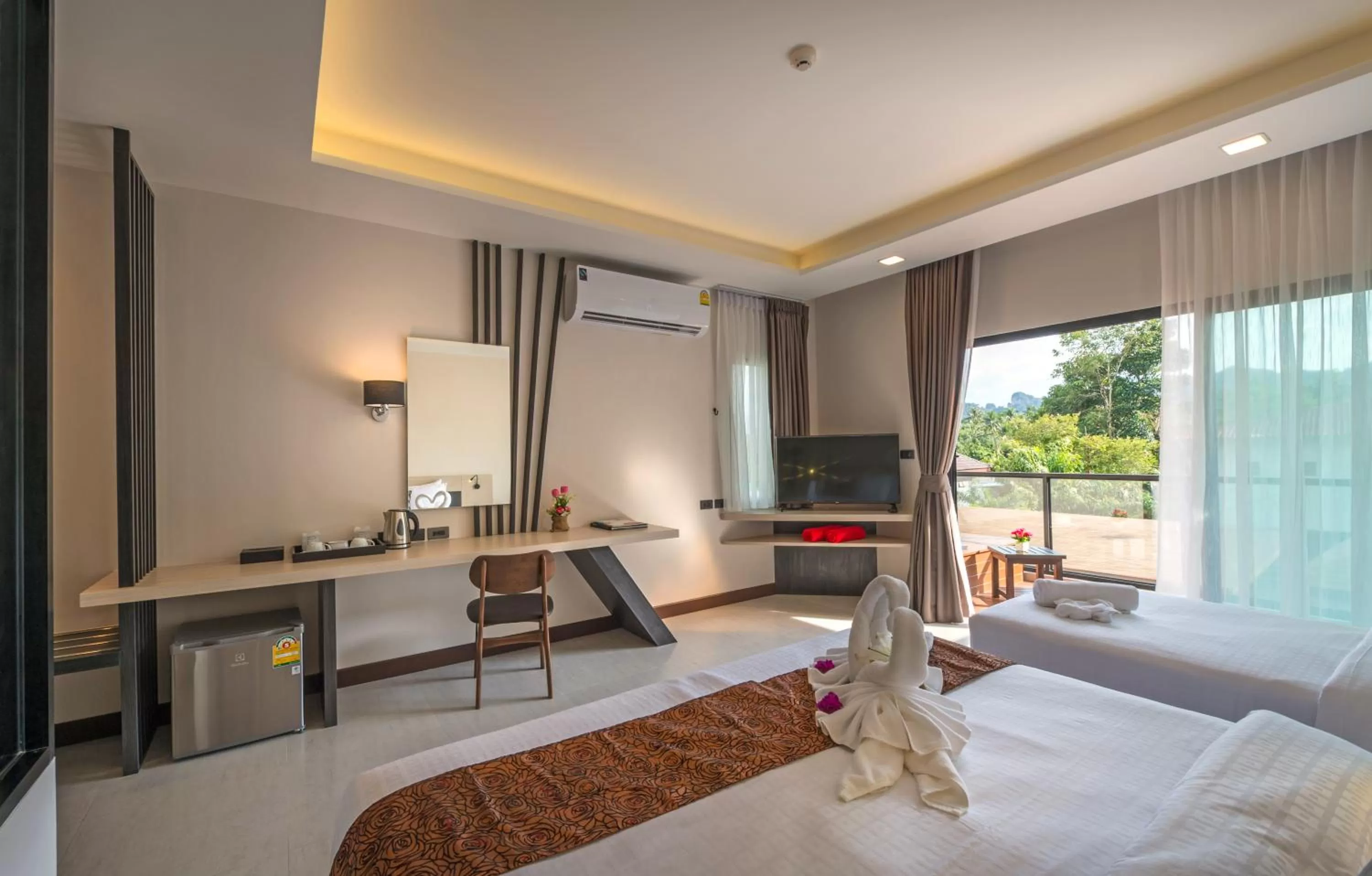 Communal lounge/ TV room, Bed in Cher​mantra​ Aonang​ Resort & Pool​ Suite