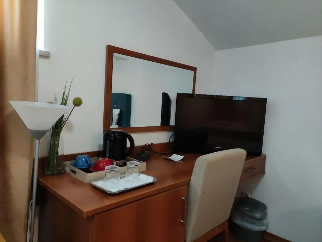 TV and multimedia, TV/Entertainment Center in Hotel Ambasador