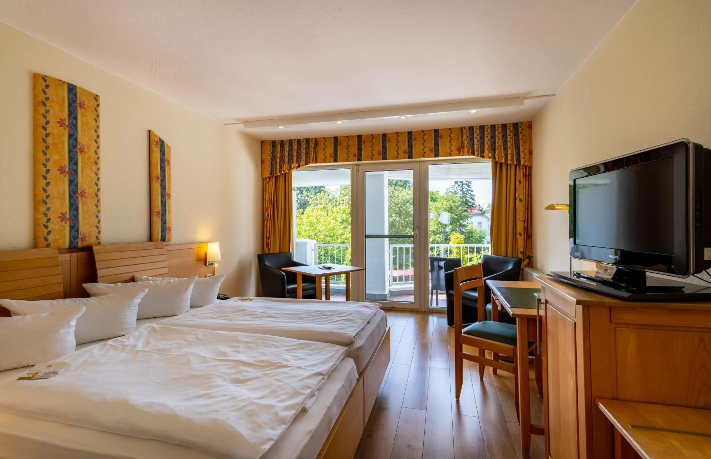 Photo of the whole room, Bed in Seehotel Fährhaus