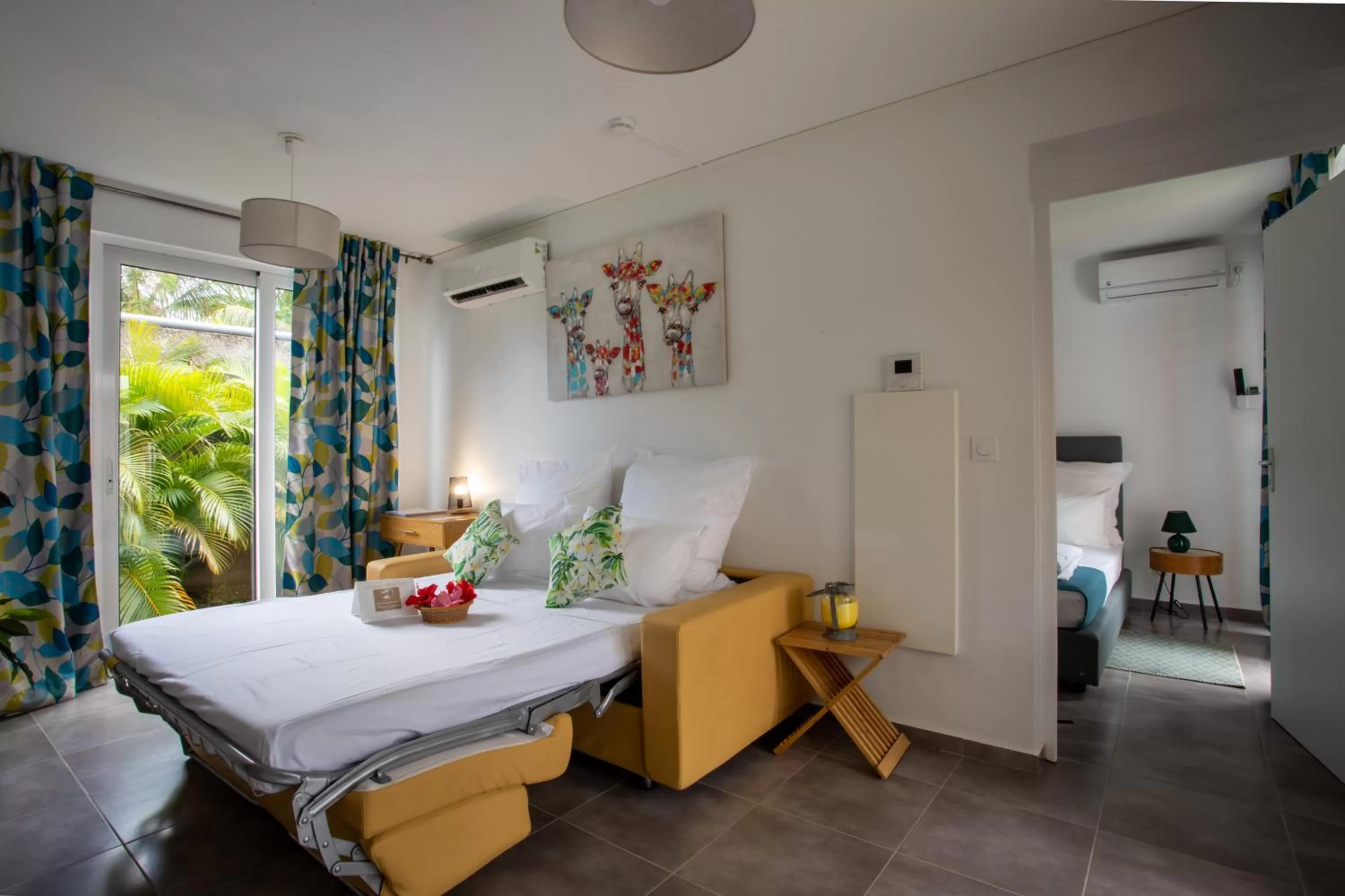 Bed in Hôtel Guadeloupe Palm Suites