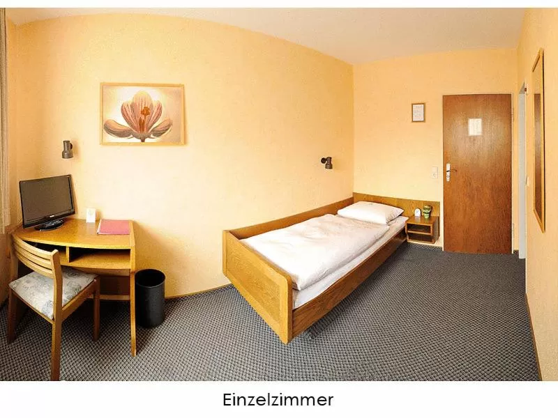 Bed in Hotel Keinath Stuttgart