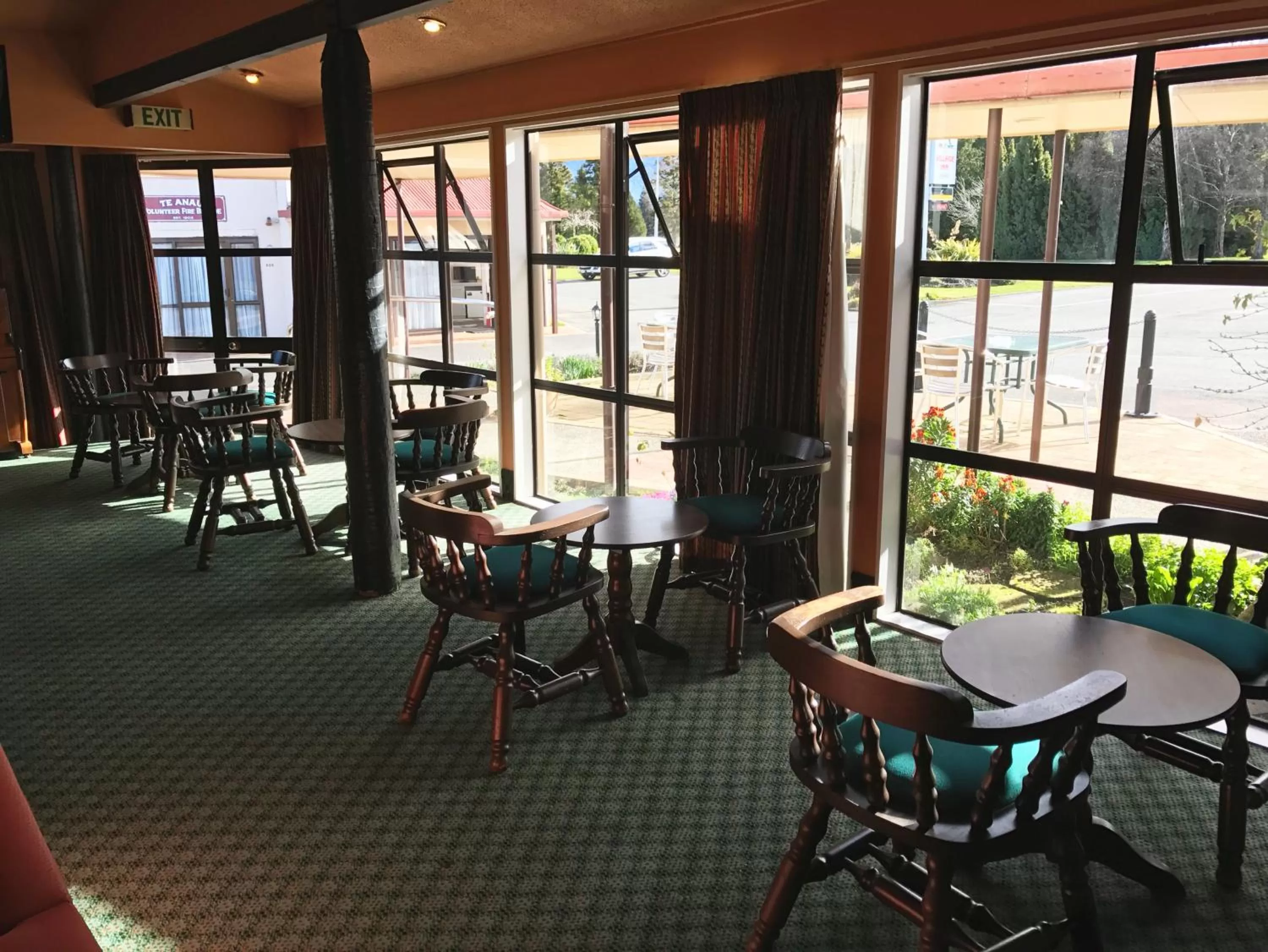 Lounge or bar in The Village Inn Hotel