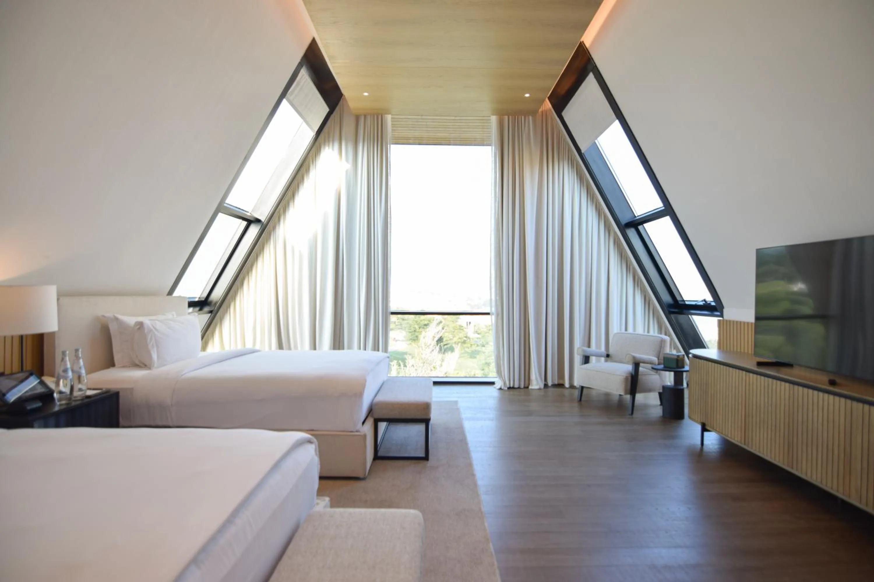 Bedroom, Bed in Katara Hills Doha, Lxr Hotels & Resorts