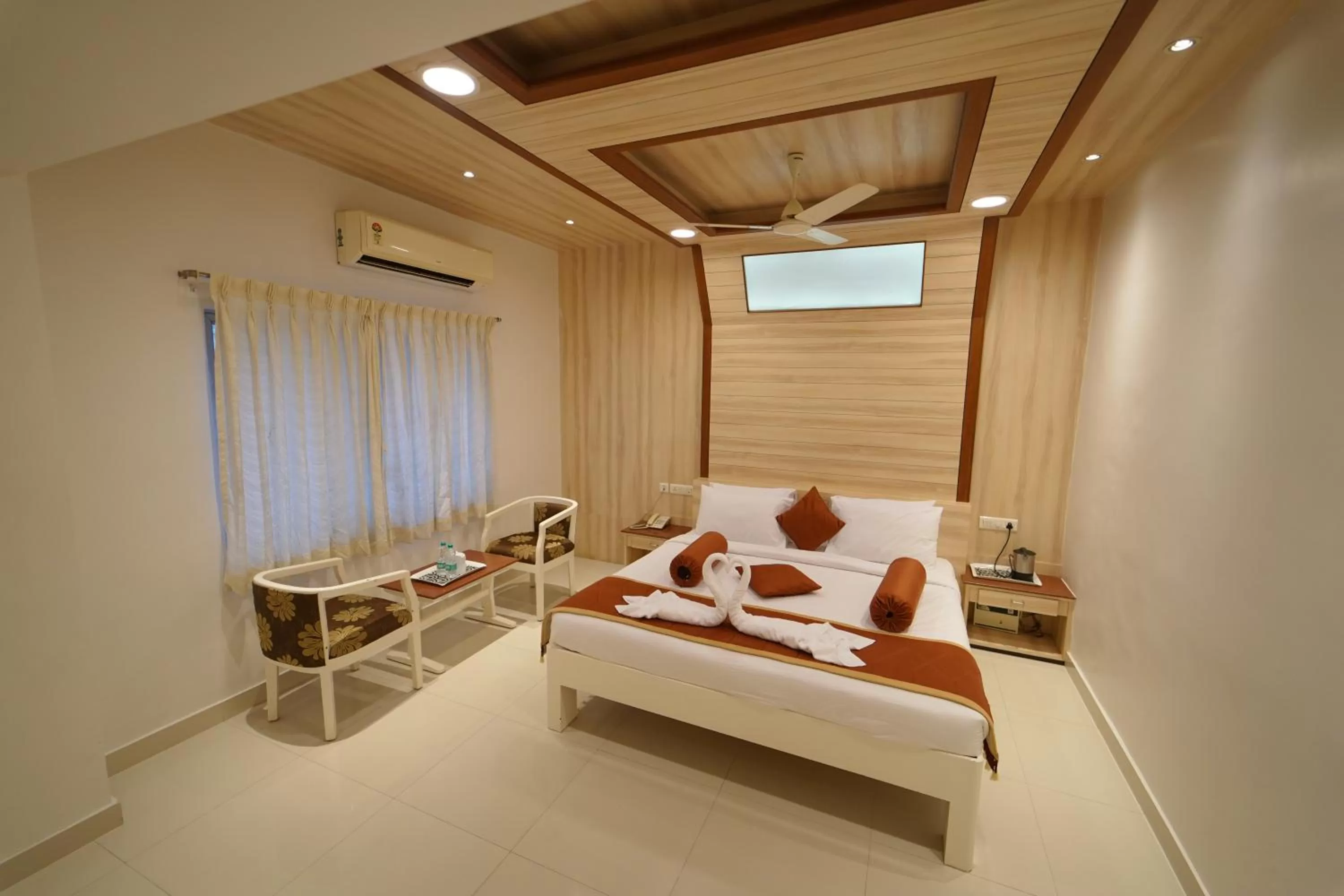 Photo of the whole room, Bed in Hotel Palmyra Grand Inn