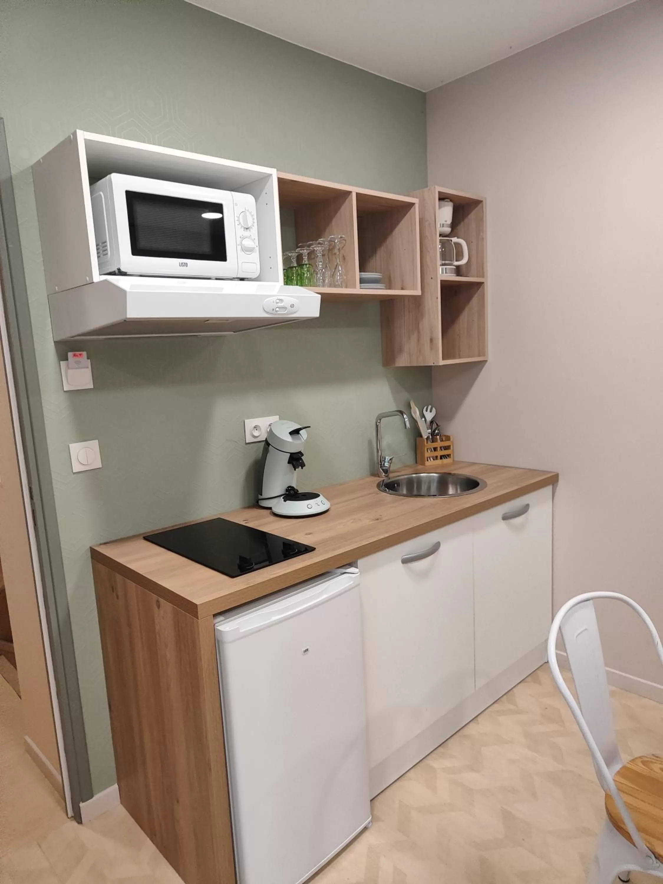 Kitchen or kitchenette in Hotel de la Terrasse