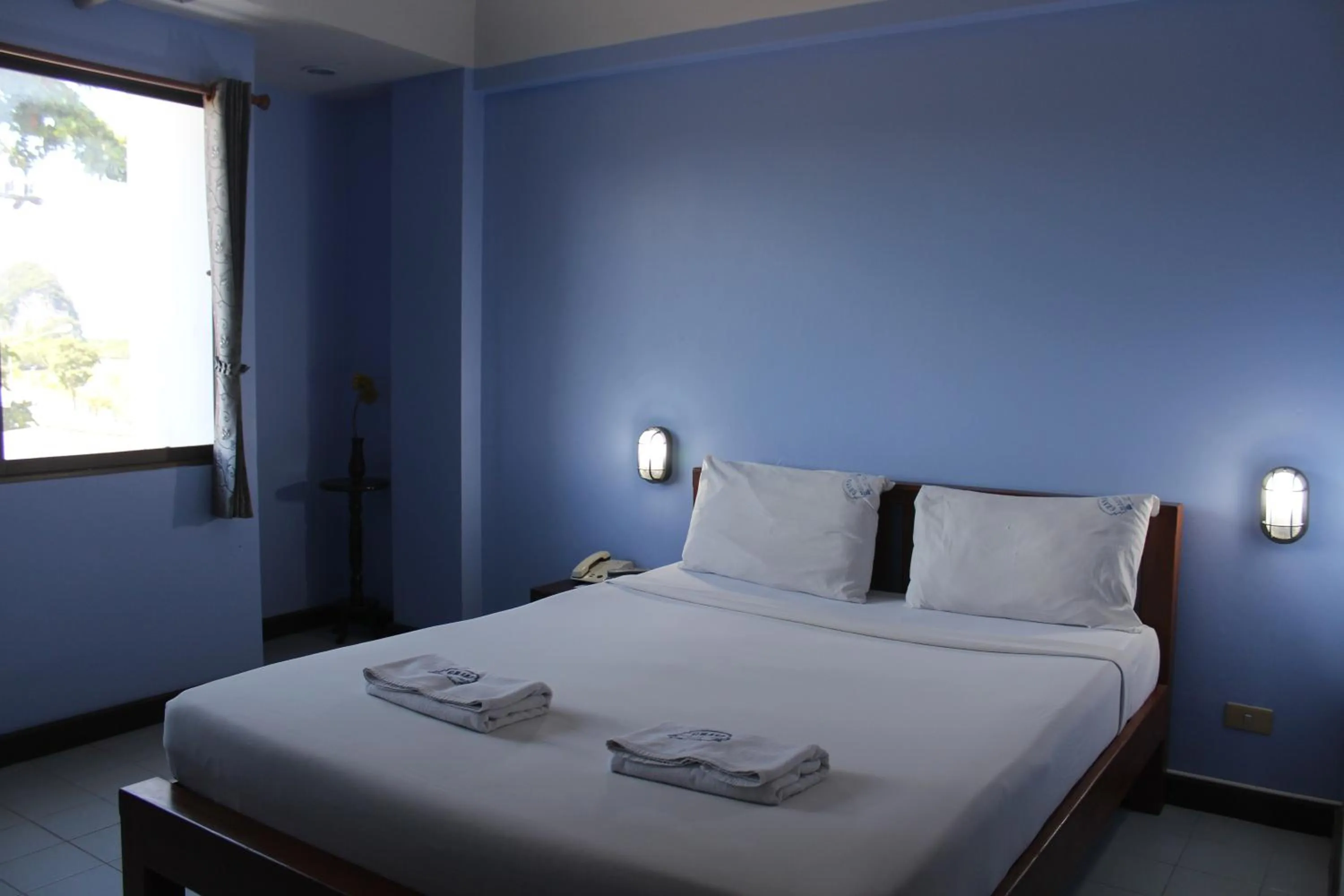 Photo of the whole room, Bed in Grand Mansion Hotel