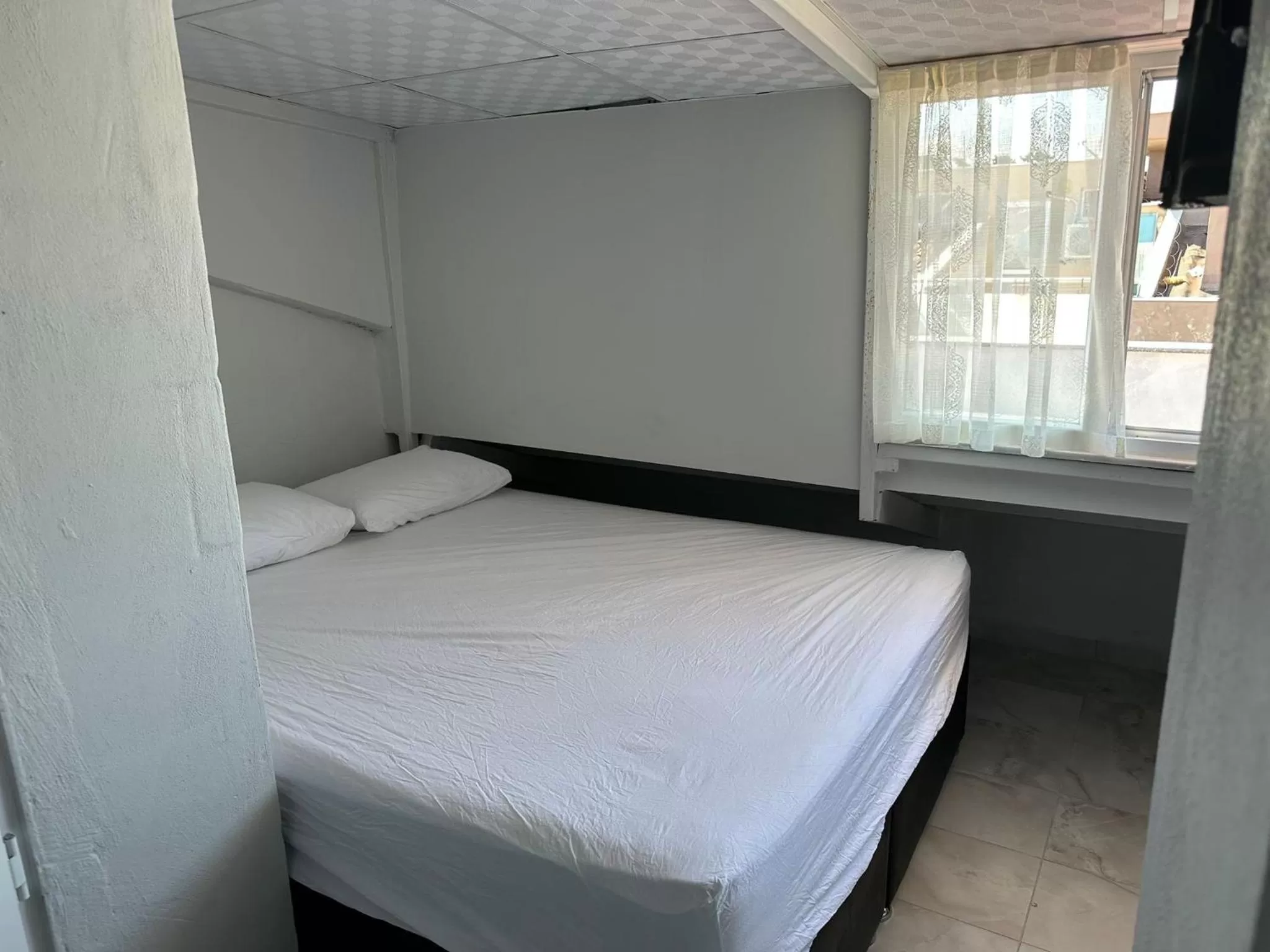 Bathroom, Bed in NR1 HOTEL