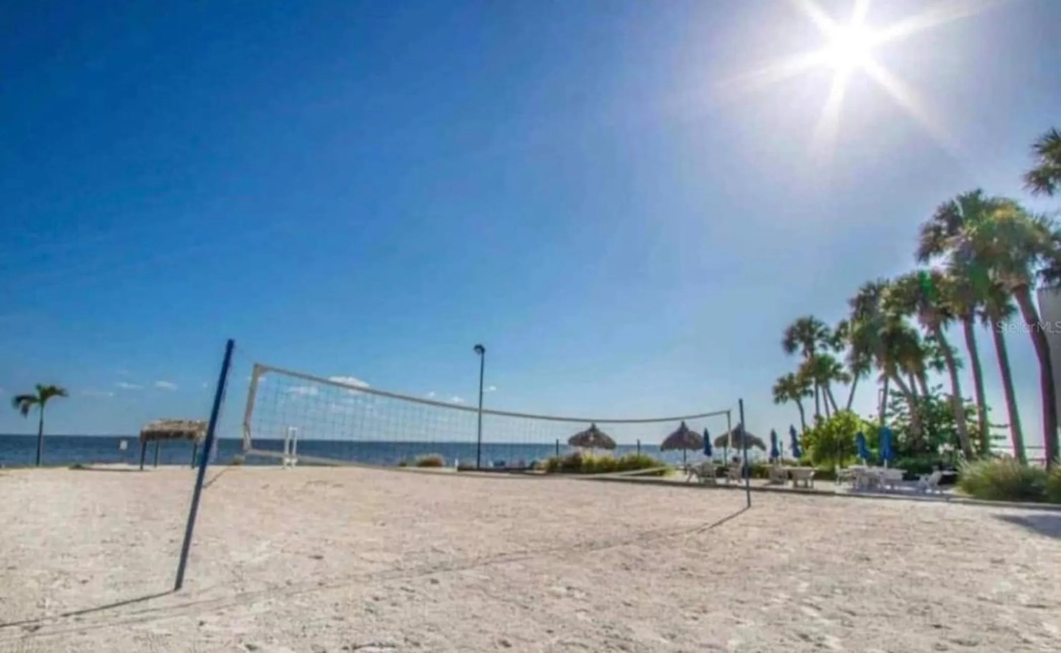 Beach in 2 Bed Condo with Balcony Facing Pool and Sunsets!