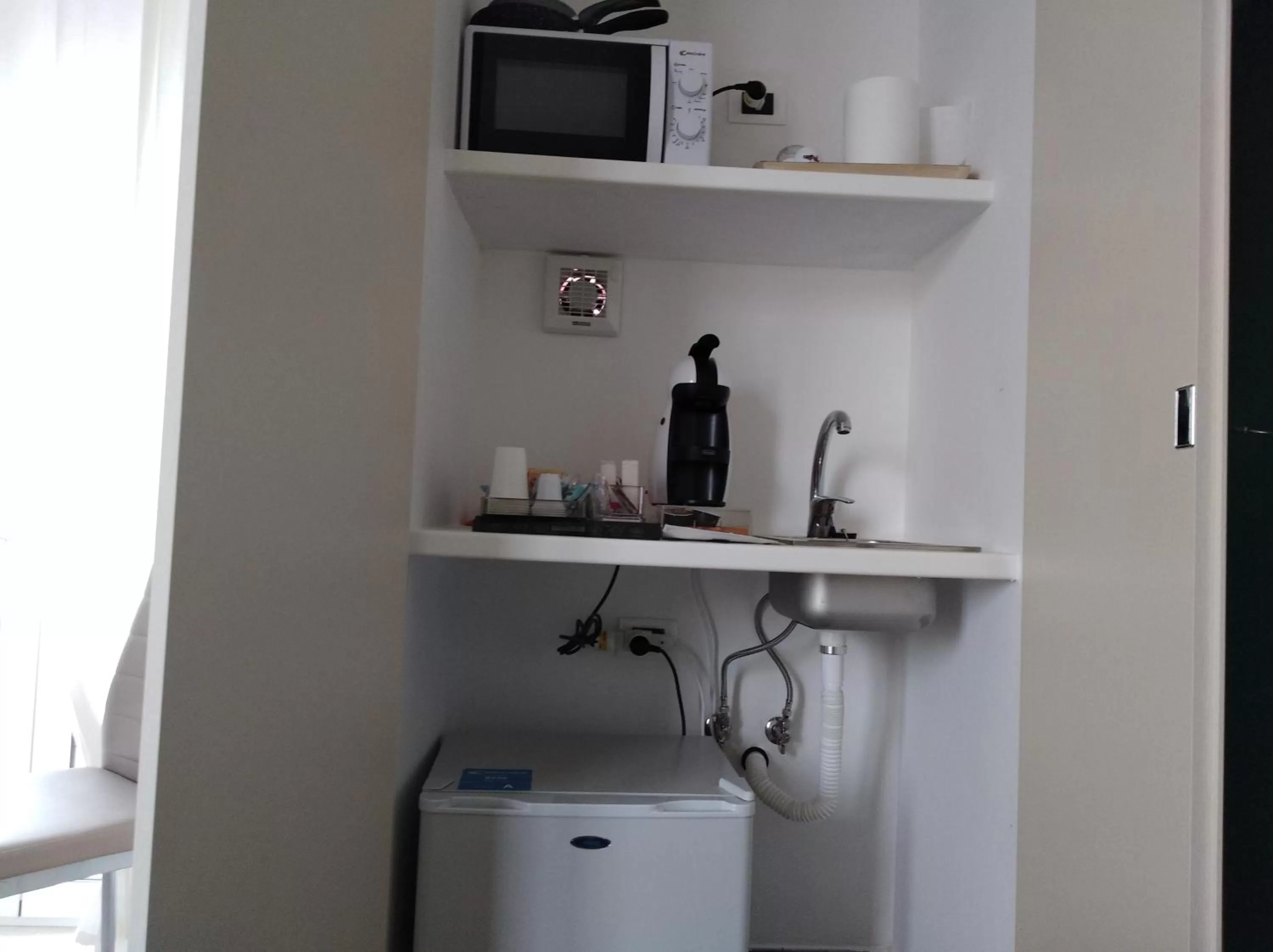 Kitchen or kitchenette in DomuS al Corso B&B