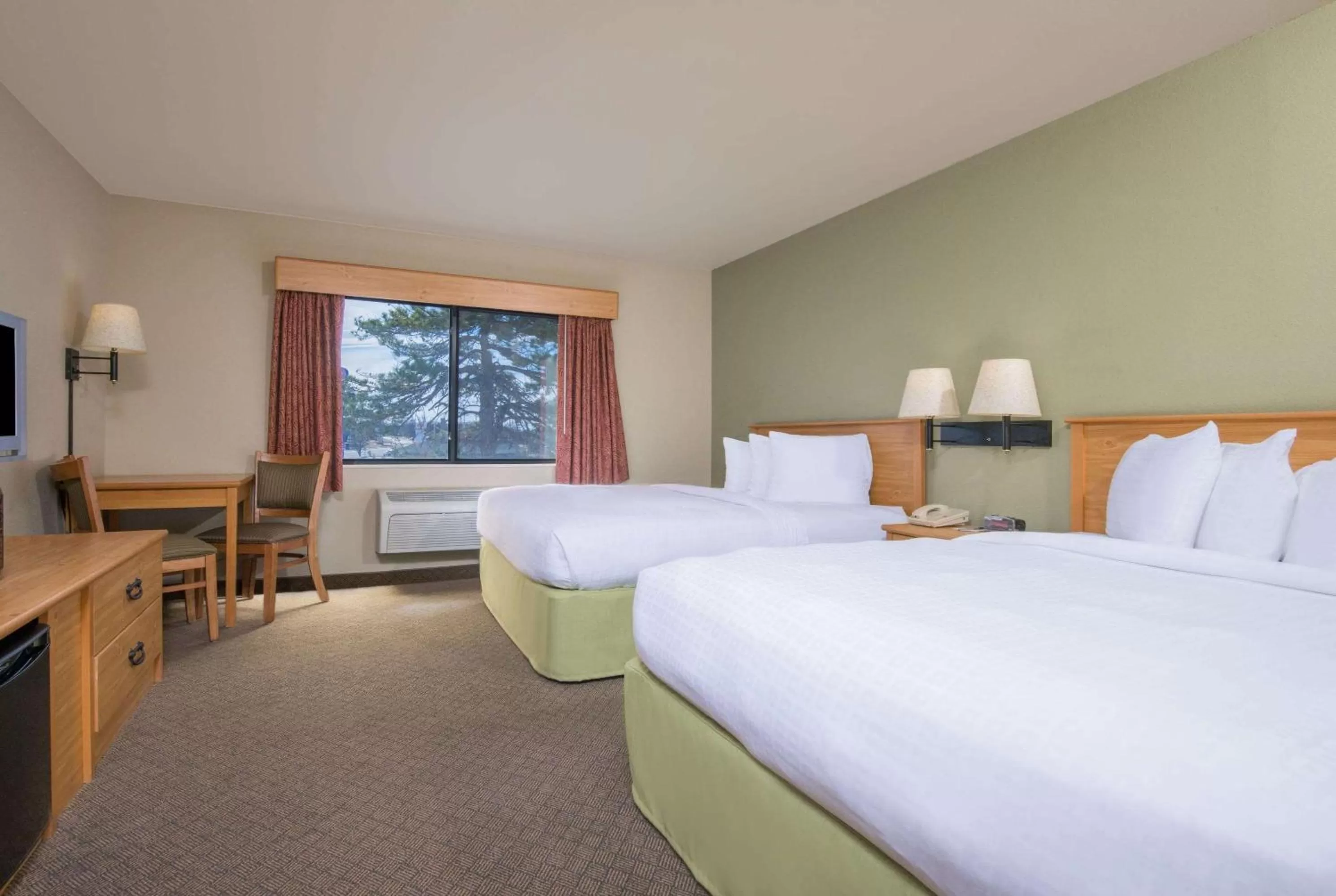 Photo of the whole room, Bed in AmericInn by Wyndham Pampa Event Center