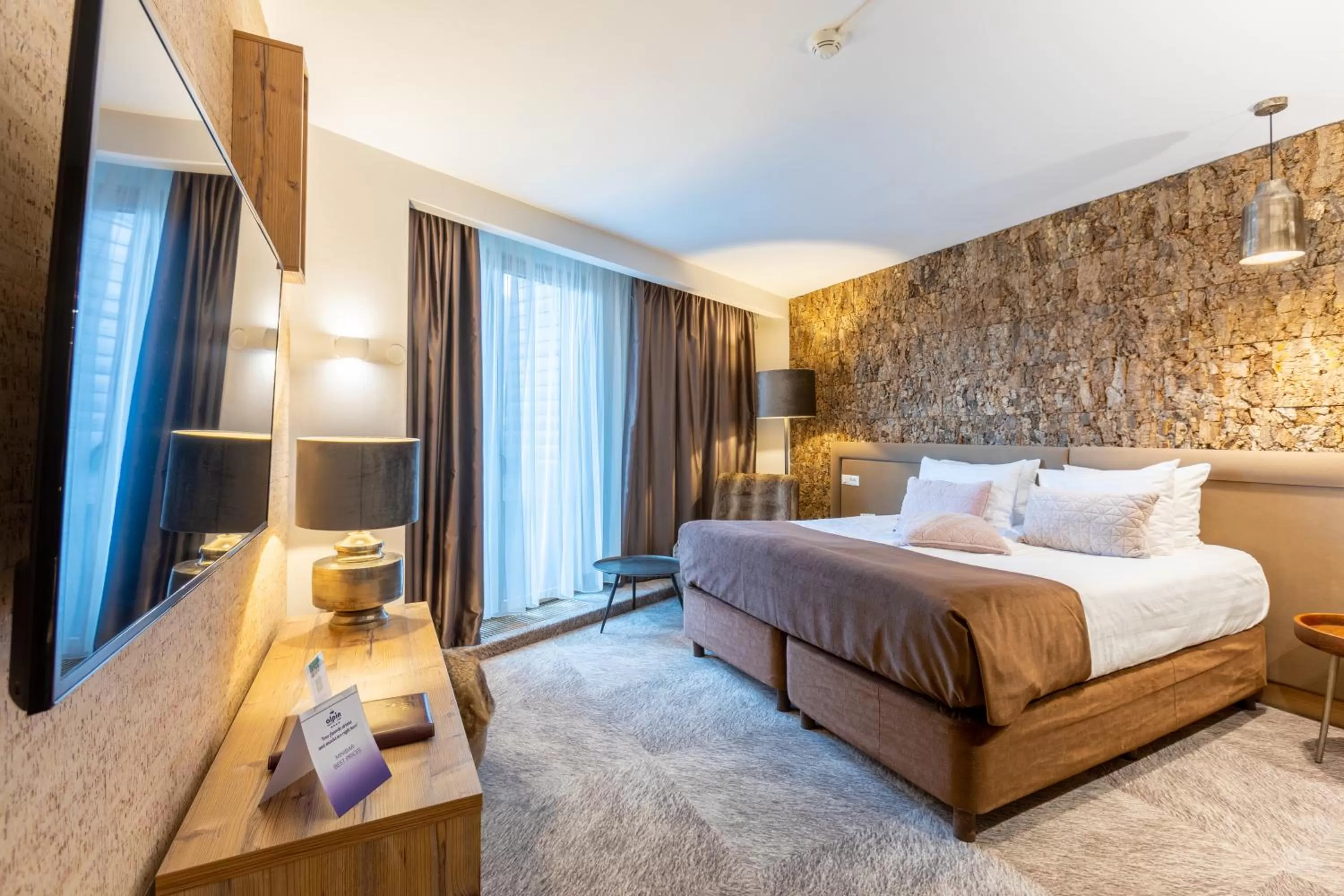 Bed in Alpin Resort Hotel