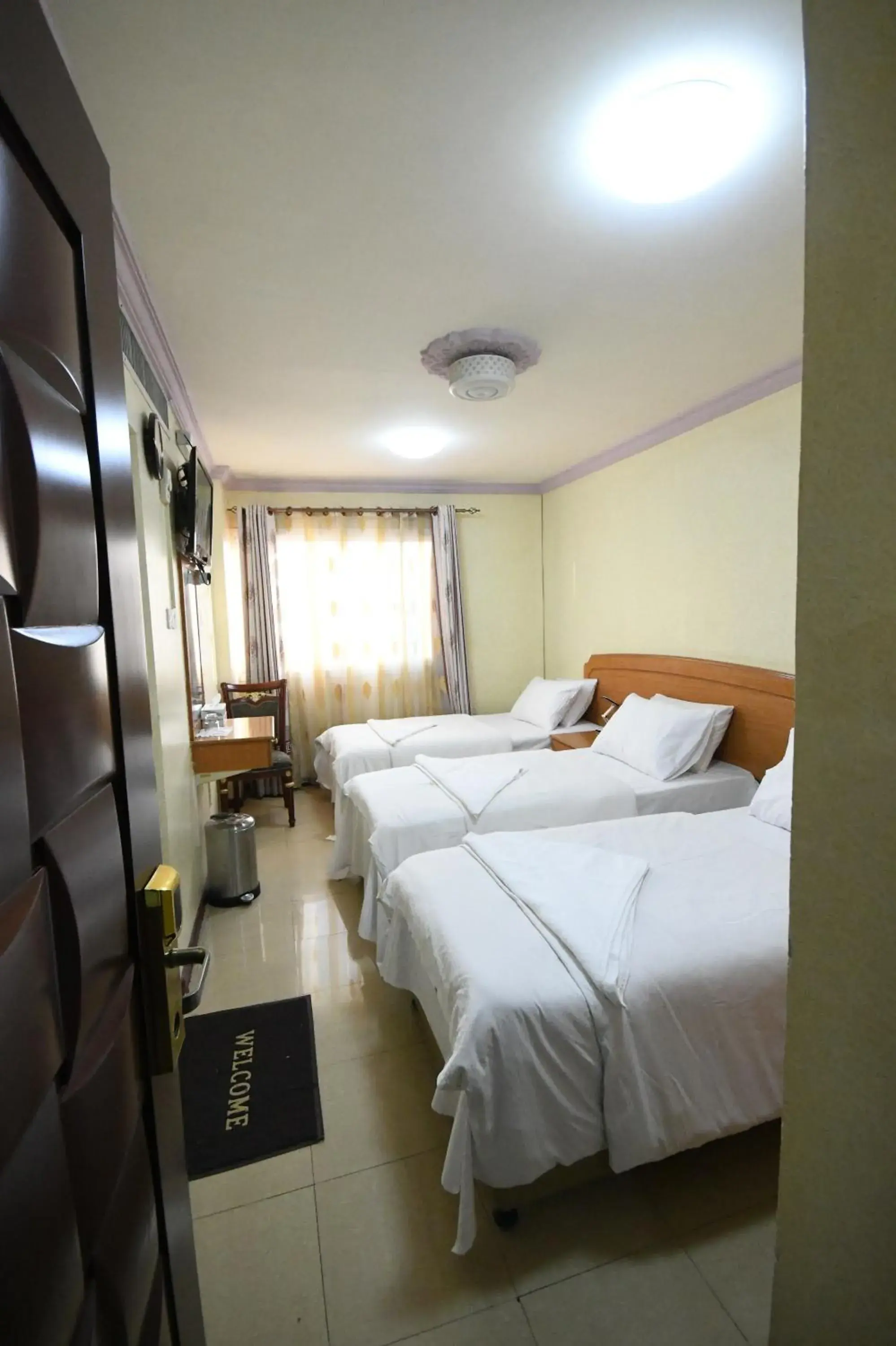 Standard Triple Room in Maaeen Hotel Standard Triple Room in Maaeen Hotel