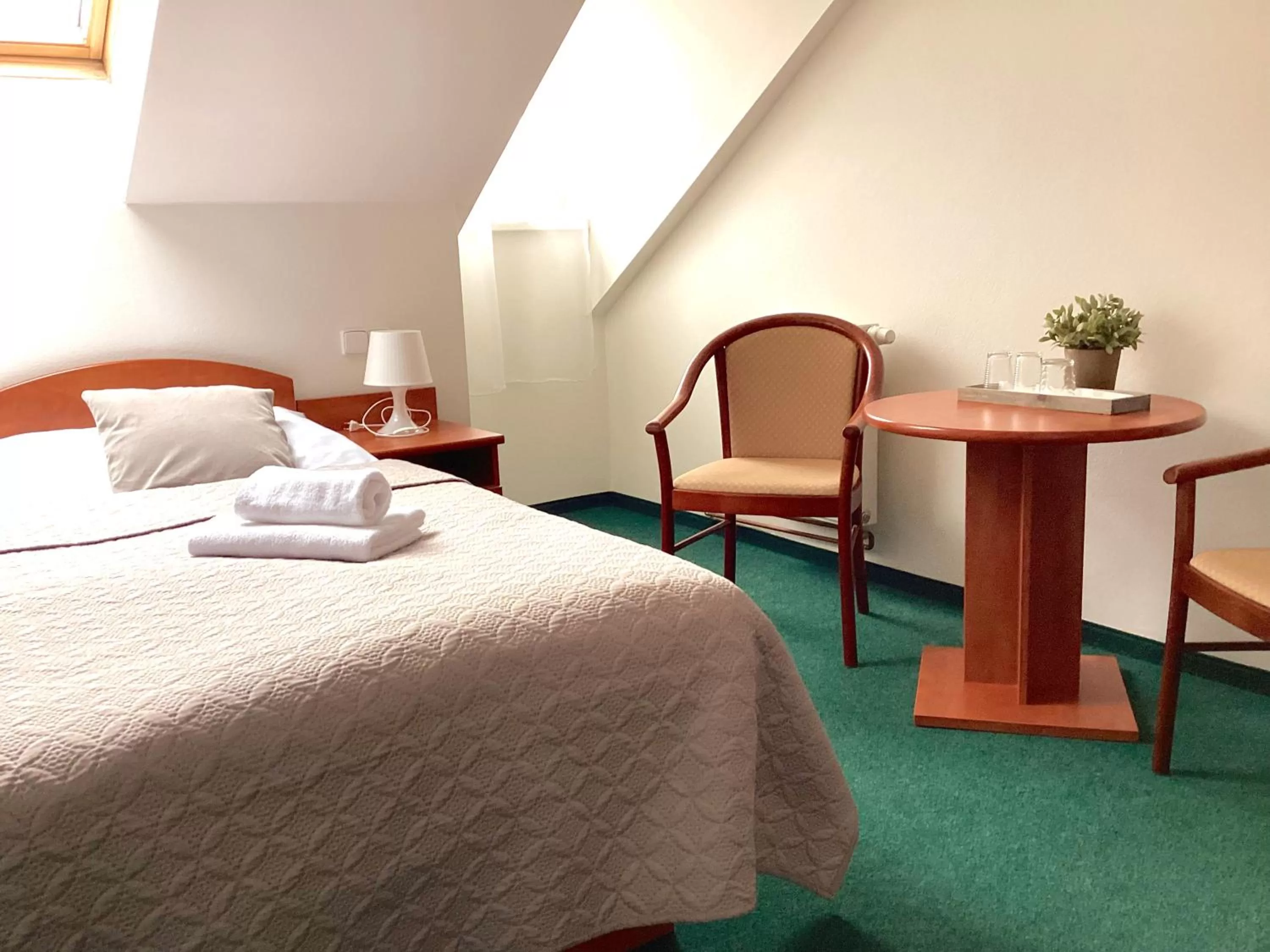 Bed in Hotel Karolina