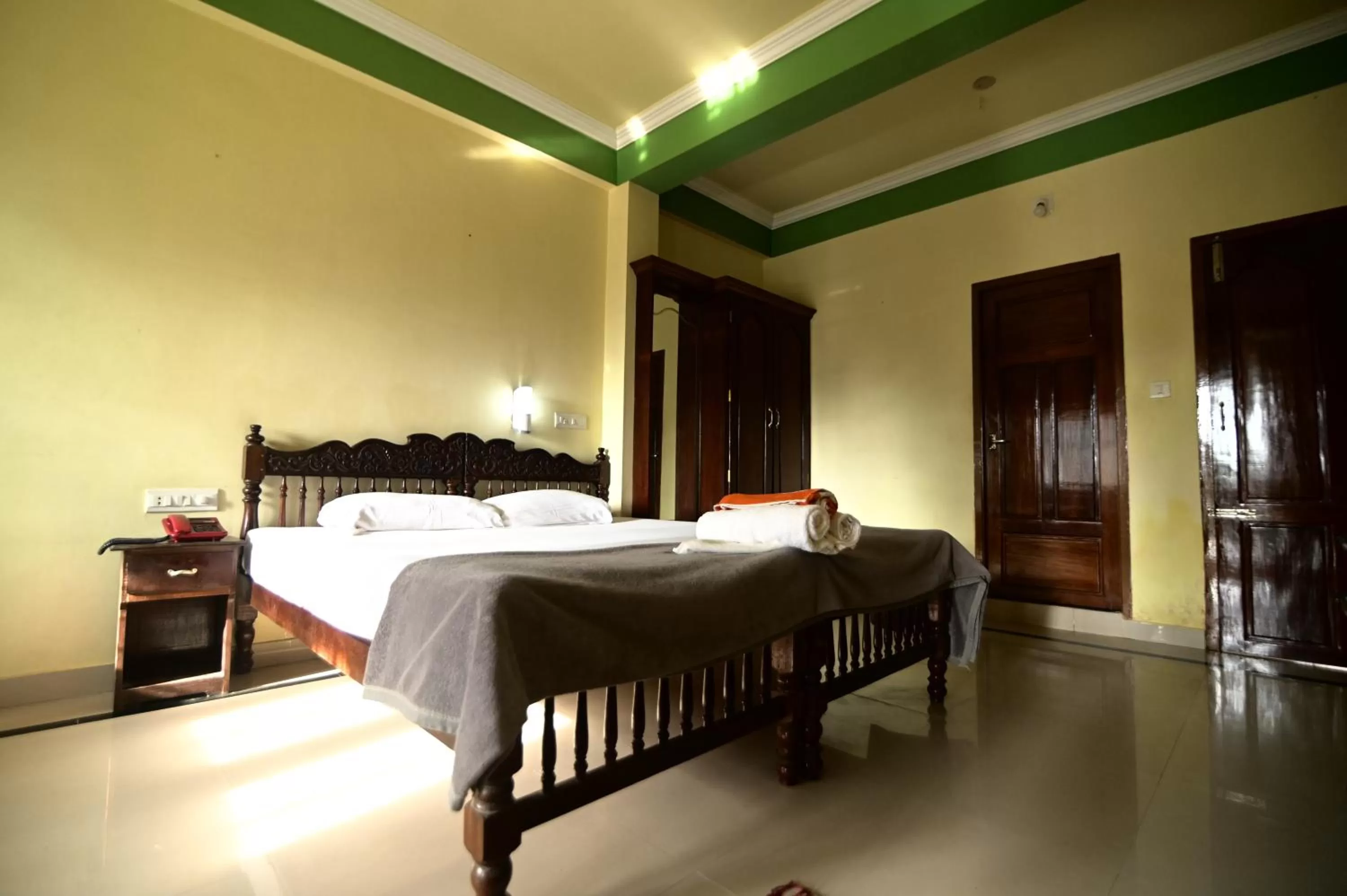 Bed in Sree Mookambika Beach Resort