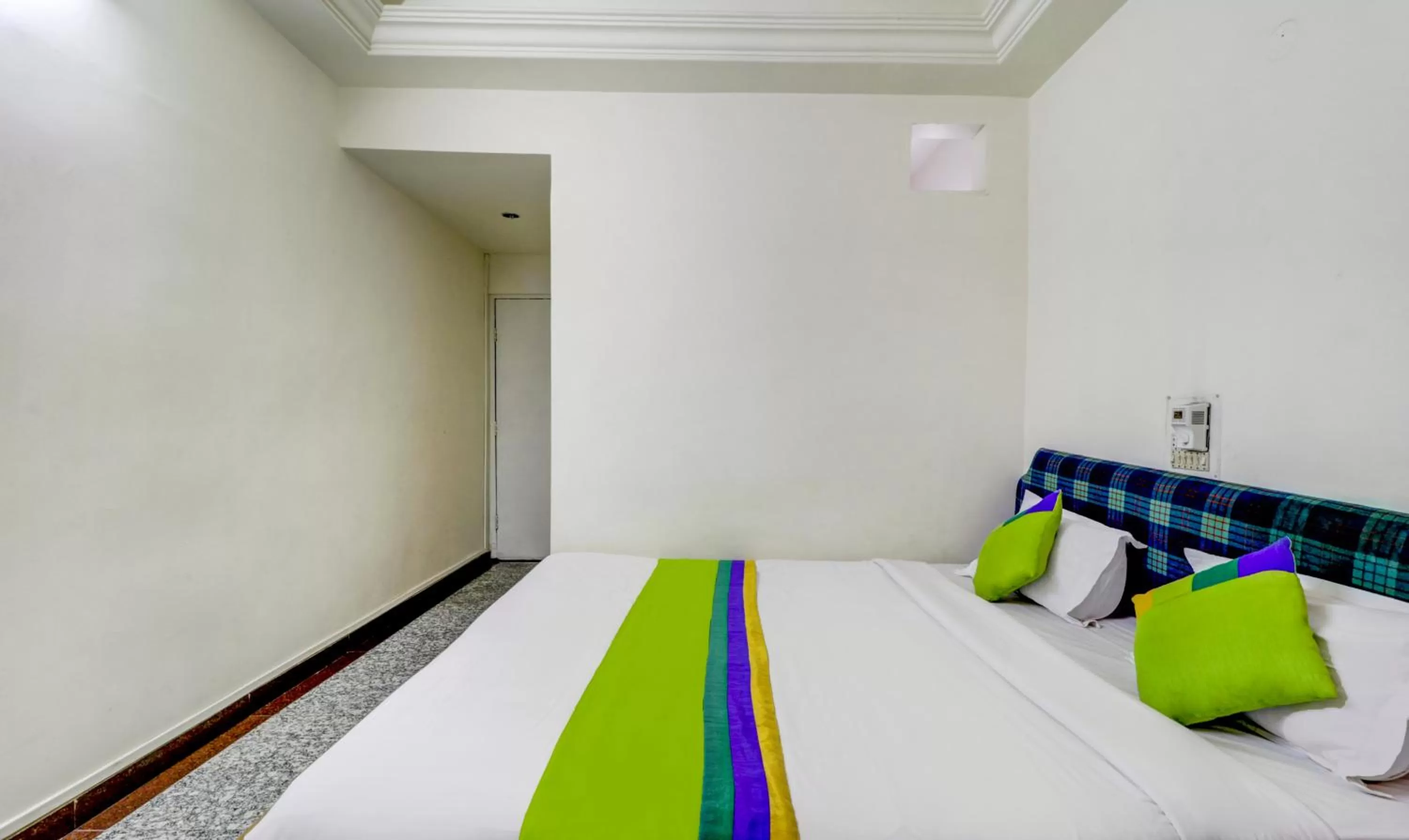 Bed in Treebo Trend Orange City