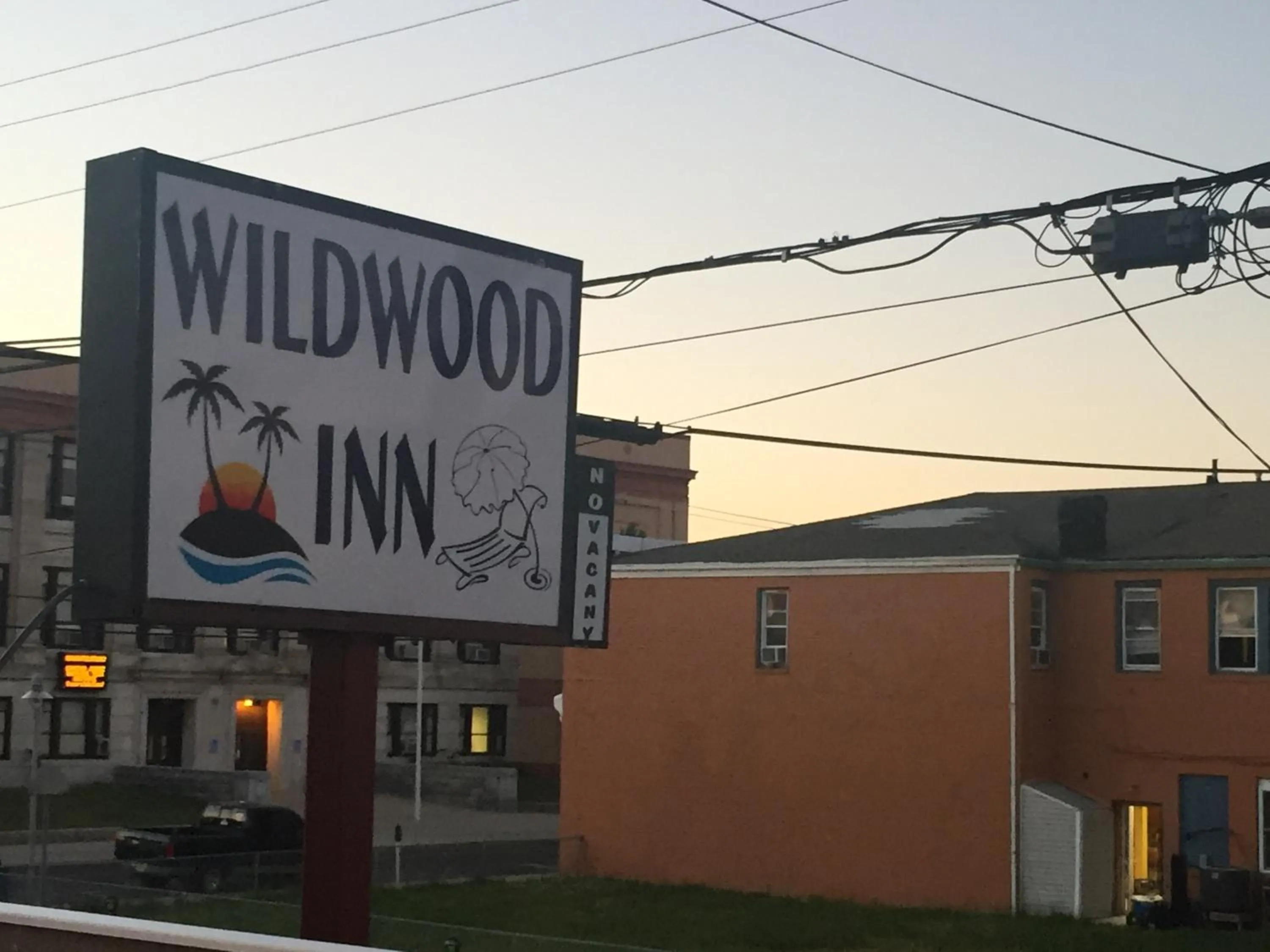 Property logo or sign in Wildwood Inn Hotel Travelodge Beach & Boardwalk