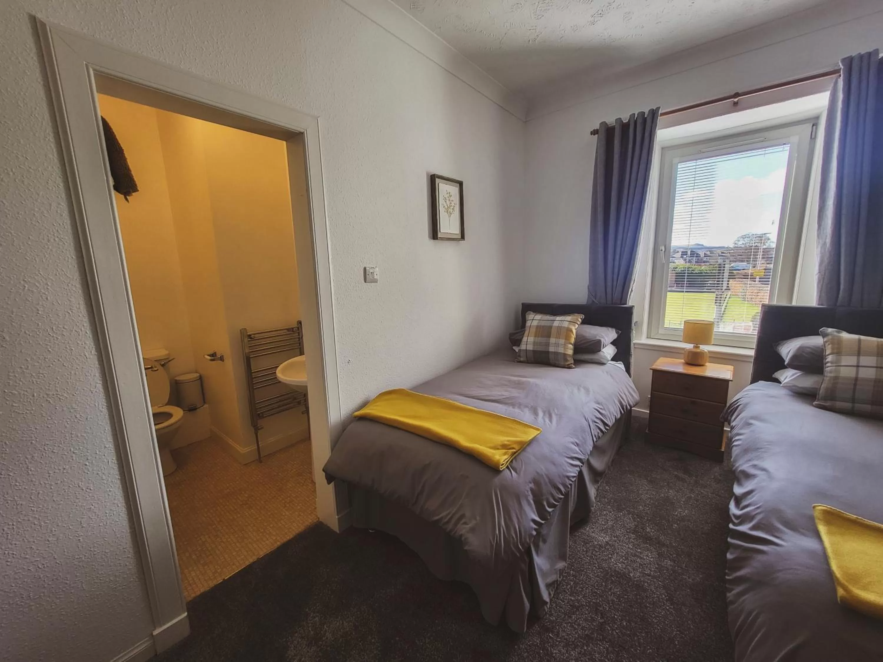 Bed in THE EARN HOTEL