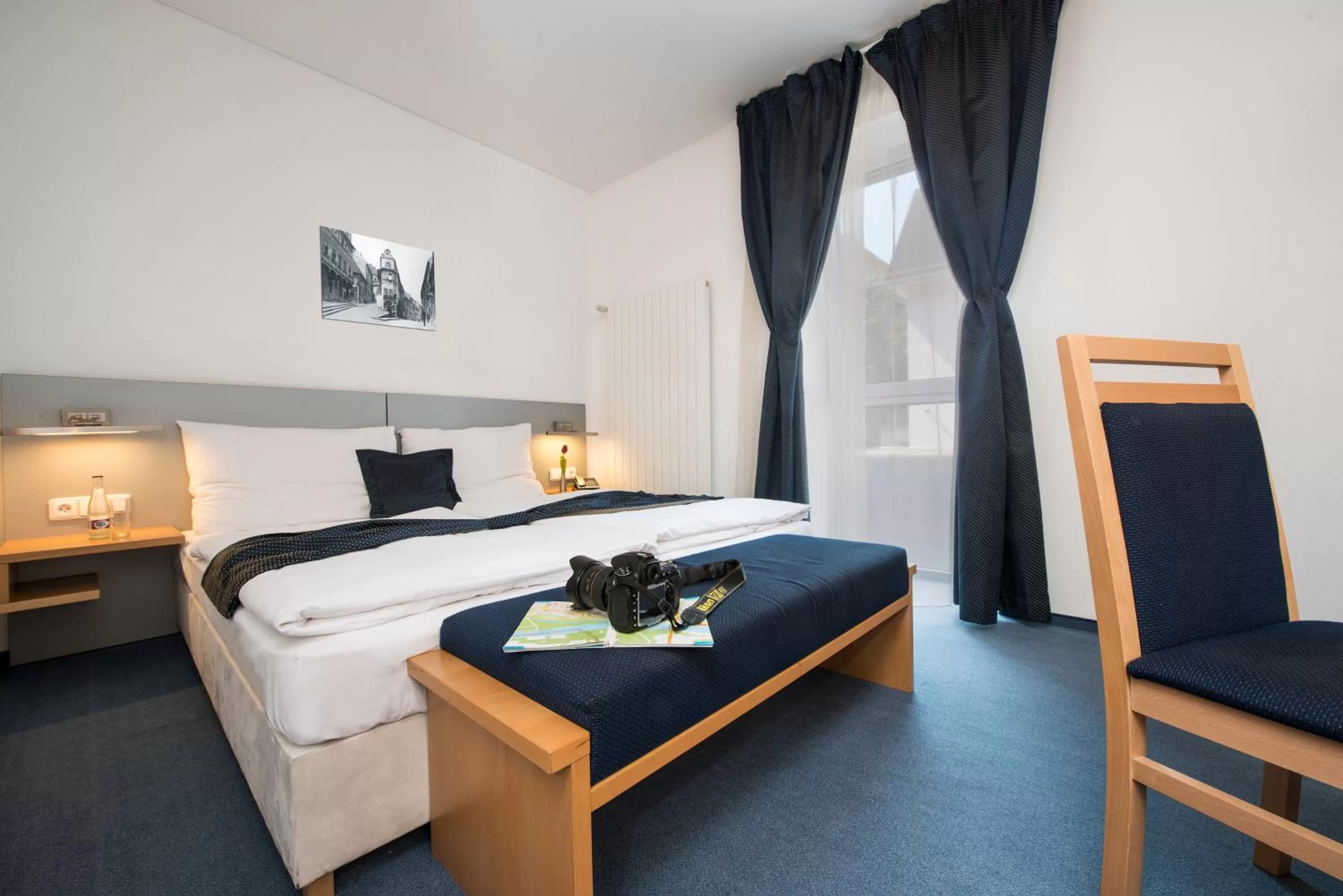 Bed in Felicity Garni Hotel