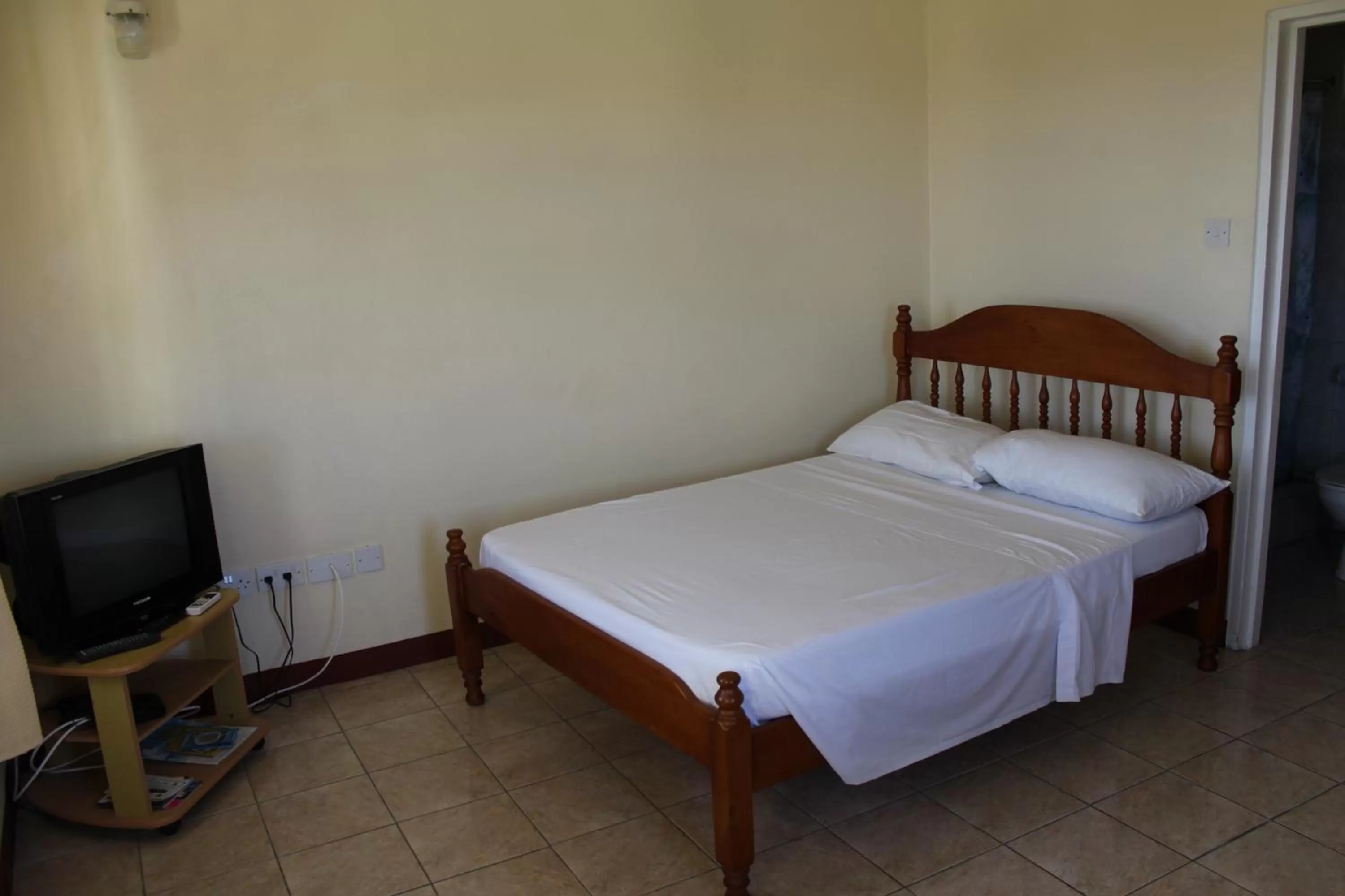 Bed in The Relax Inn