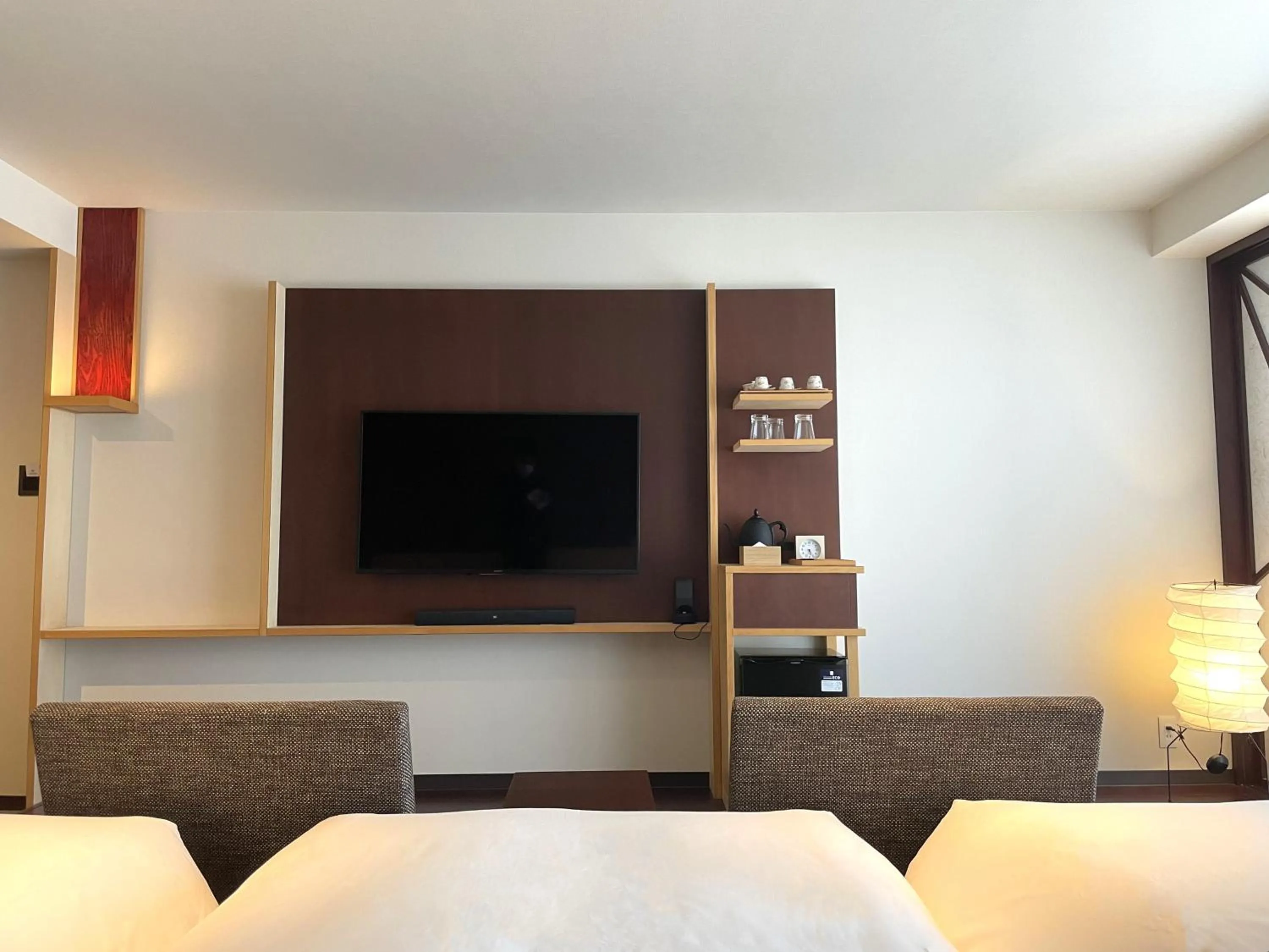 Photo of the whole room, Bed in HOTEL AMANEK Kanazawa