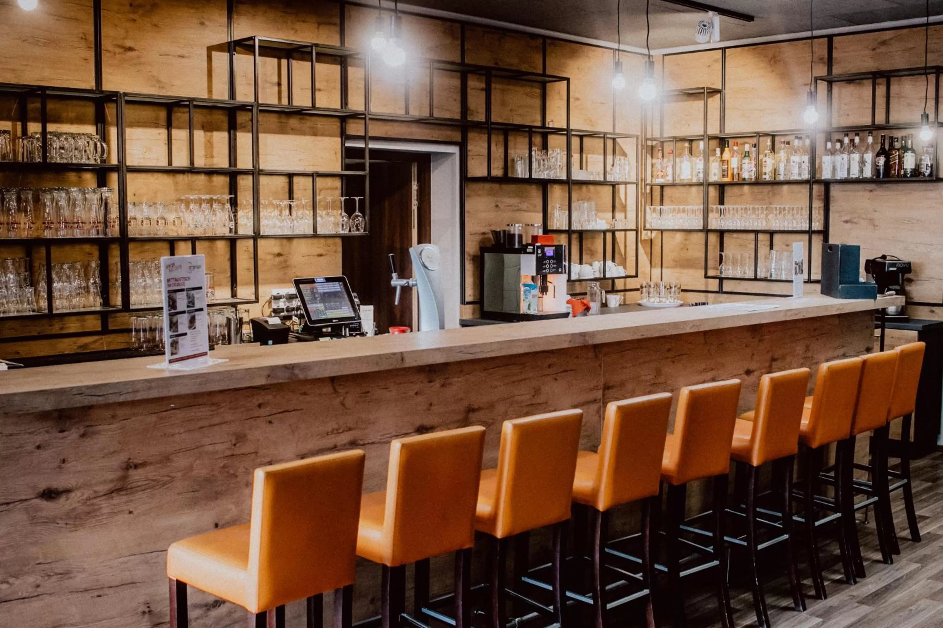 Lounge or bar in Orange Hotel und Apartments