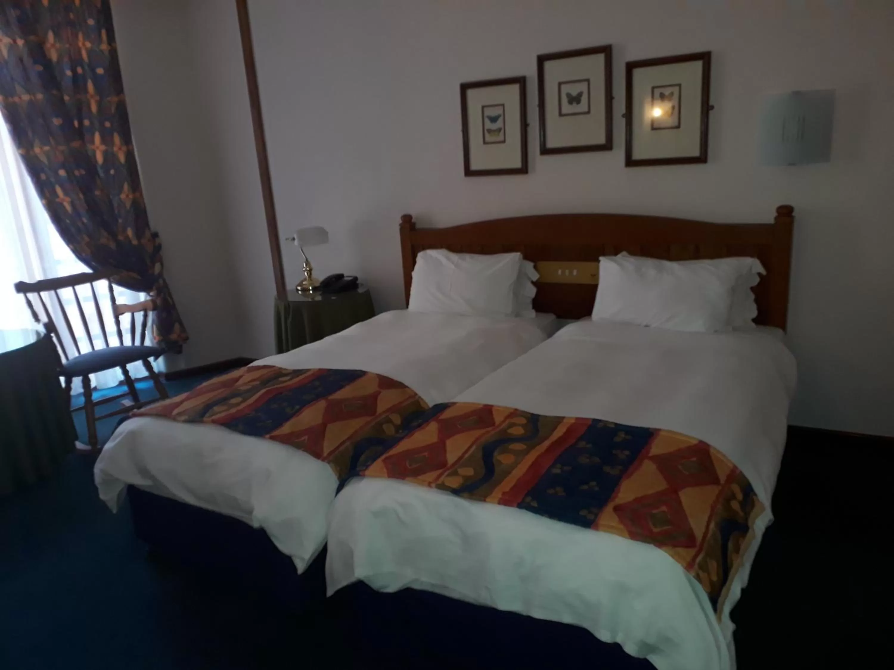 Bed in African Sky Hotels - Pine Lake Inn