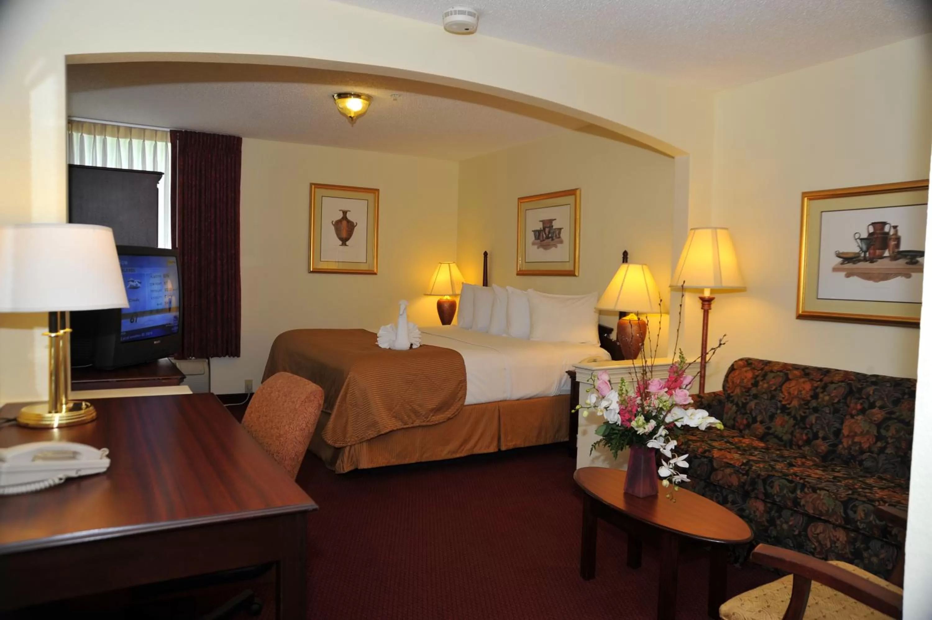 Bed in Opal Hotel & Suites